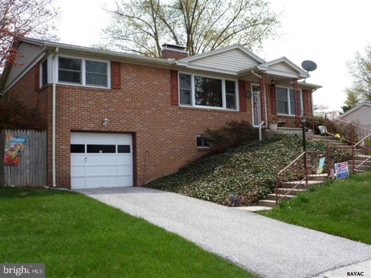 Lovely ranch home in desirable location. Highlights of this home include hardwood floors, two wood burning fireplaces, spacious living and dining rooms and basement rec room. Updates include Andersen replacement windows, a full complement of appliances included, custom window blinds thruout, new kitchen countertops and more! Warm and welcoming; a must see!