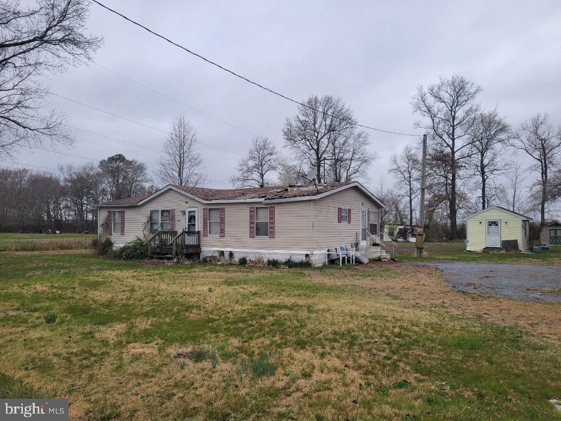 MULTIPLE OFFERS IN HAND. HIGHEST AND BEST DUE WEDNESDAY 4/9 AT NOON.  Looking for a great country setting to start your next chapter? This is almost an acre of land with a mobile home that is of no value. Roof is bad and access to the home is not permitted.