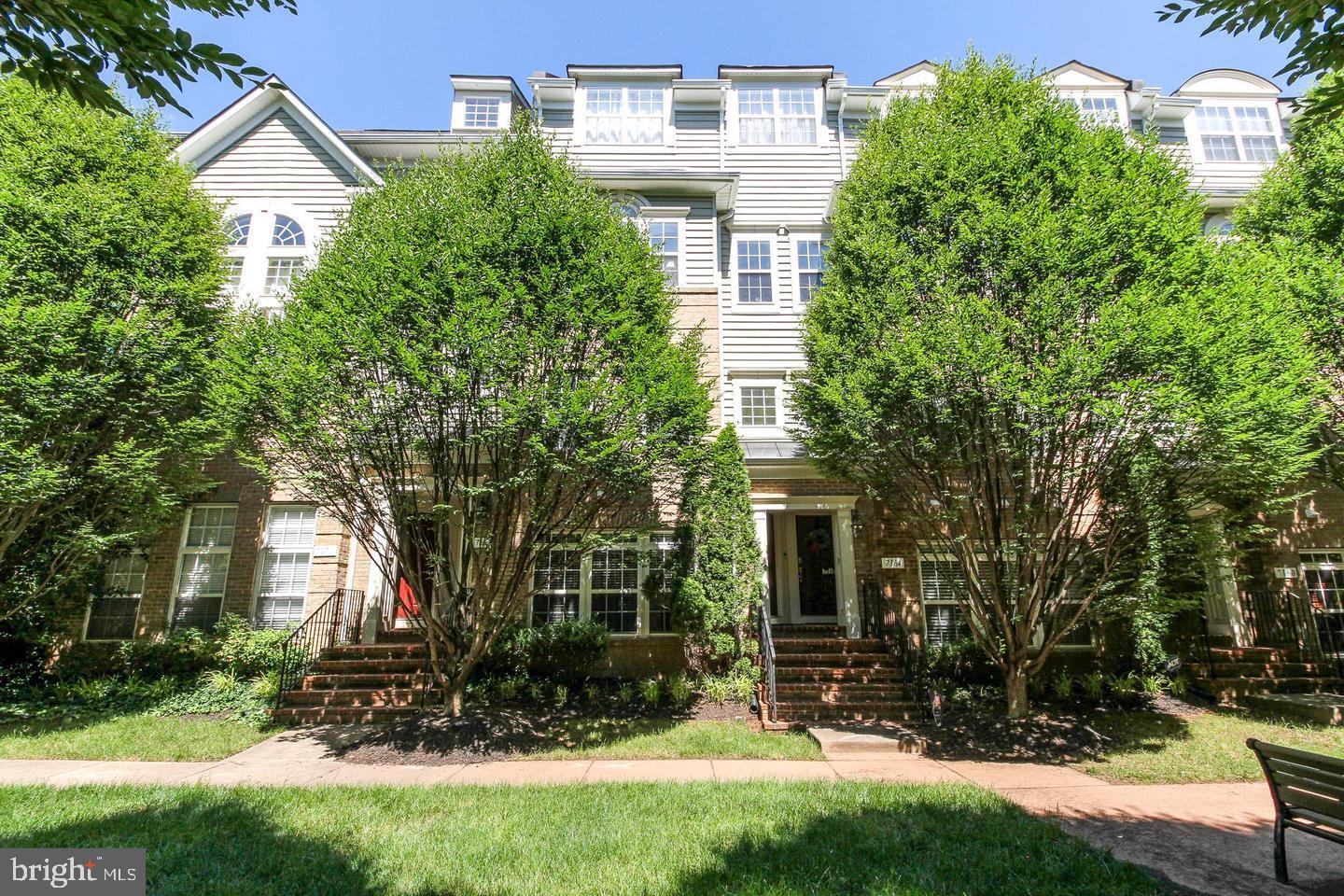 **BRAND NEW AC SYSTEM AND A UV LAMP HAVE JUST BEEN INSTALLED**Welcome to this beautiful townhouse-style 3BD/2.5BA condo in a prime location! Enjoy quick access to I-66, Route 29, Route 15, the commuter lot, and convenient shopping and dining at Virginia Gateway and beyond. Entry is available through the one-car rear garage or along a charming, tree-lined sidewalk in the front. Inside, you’ll find a stunning kitchen featuring granite countertops, a gas stove, stylish backsplash, and pantry, all opening seamlessly to the dining and living areas—perfect for entertaining. The kitchen tile has been professionally cleaned and the grout resealed, offering a fresh, well-maintained feel. A private half bath is thoughtfully tucked away on the main level. Hardwood floors and large windows throughout the main floor fill the home with warmth and natural light, complemented by fresh paint throughout in the designer color Edgecomb Gray. Upstairs, the spacious primary suite includes a remote-control ceiling fan, two closets (including a walk-in), and a beautifully appointed en-suite bath with dual vanities, a separate shower, and a soaking tub. The primary bedroom also features a custom-built electric fireplace adding both charm and modern comfort. Brand-new LVP flooring enhances the entire upper level. The second and third bedrooms offer double closets, remote-control ceiling fans, and access to a balcony overlooking a peaceful pond. For added convenience, the laundry area is located on the bedroom level. This home has truly everything you've been looking for!