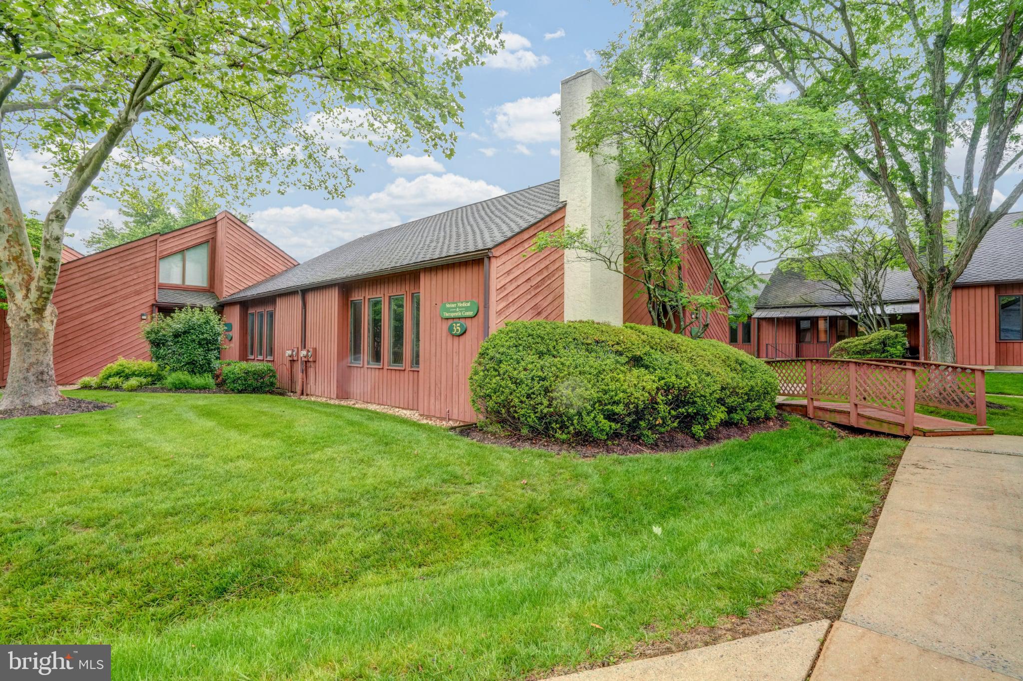 Fantastic opportunity to own a large commercial space within The Commons at Valley Forge in Phoenixville, PA. This sale is for TWO (2) combined units designated #35 and #36, totaling nearly 4000sqft+/-. Previously designed as a doctor's office, ideally positioned for new ownership to jump in and continue with their personal practice, or make some tweaks for any number of uses (law firm, tax prep, wealth management, injections, massage) etc. Current layout consists of large waiting room with fireplace, two separate offices, 5 exam rooms and 2 bathrooms on the ground floor. 2nd floor provides an additional 4 offices and bathroom. Full basement has multiple finished buildout rooms and a large unfinished room for storage. 3 forms of ingress/egress.  Building sits currently vacant, tours available immediately.