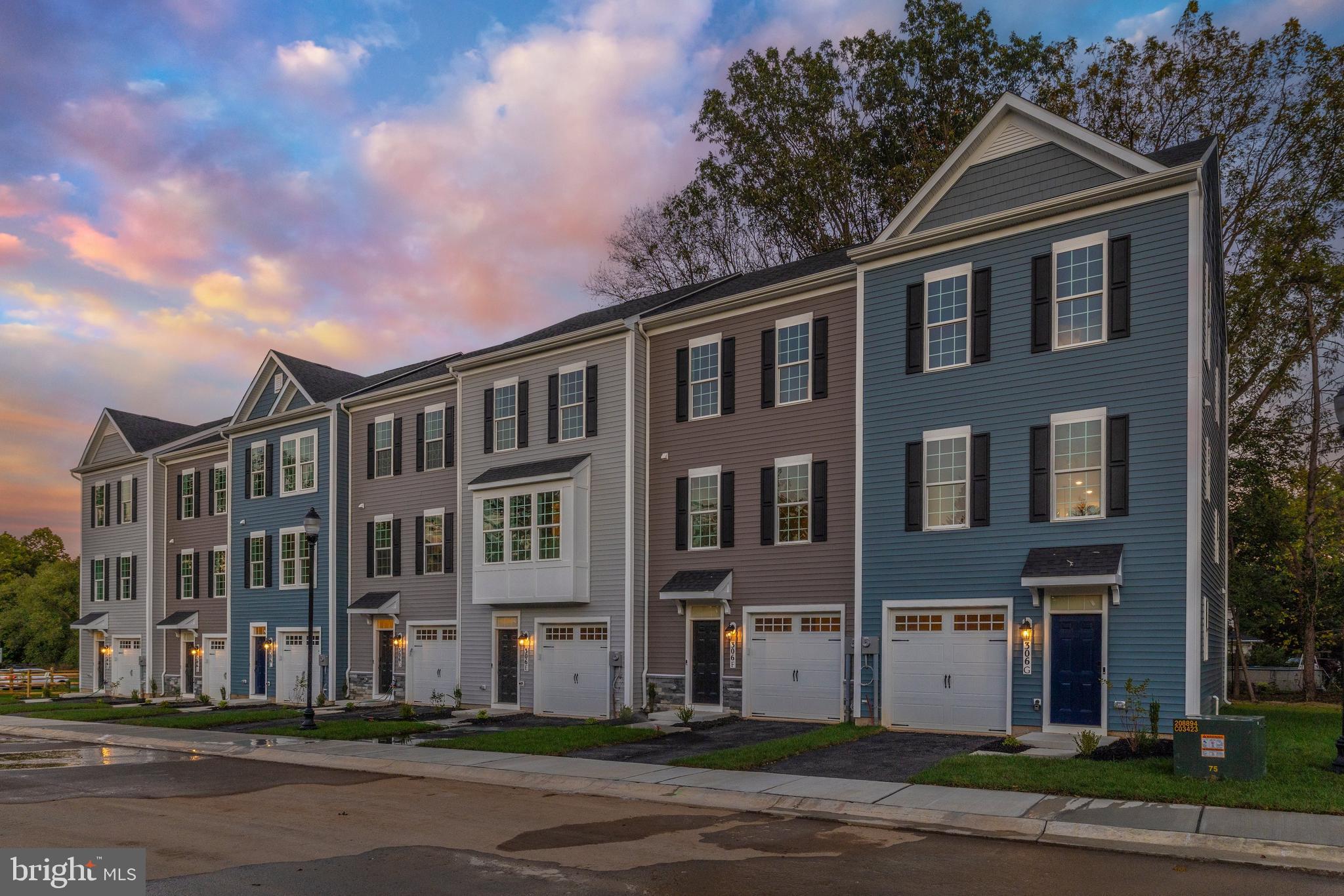 This move-in-ready Auburn II luxury townhome at The Woods offers three finished levels, 4 bedrooms, 3.5 bathrooms, and a 1-car garage in a highly walkable location near Baker Park, Rock Creek Park, and Downtown Frederick with convenient access to restaurants, shopping, and everyday amenities.
The home features a bright open-concept main level and a designer kitchen with quartz countertops, black hardware, and high-end finishes throughout. Modern construction and thoughtful design create a comfortable, low-maintenance living experience. The community is served by Parkway Elementary, West Frederick Middle, and Frederick High School. A 10/2/1 builder warranty is included for added peace of mind. OFFERING UP TO $12,500 IN CLOSING COST ASSISTANCE WITH USE OF APPROVED LENDER AND TITLE. Other units available. Photos are representative and may be virtually staged. **Monthly condo fee includes water, sewer, and condo insurance**