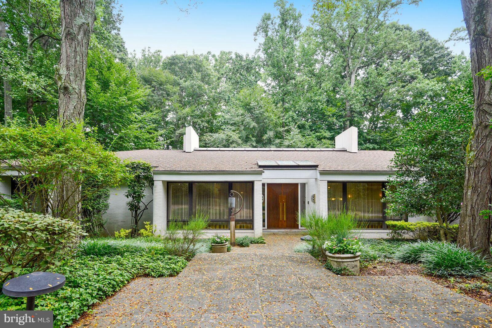 Spectacular Contemporary Custom Home Situated on 1.38 Acres of Lush Grounds. 1st Floor Living at its Finest. Skylights, Vaulted Ceilings, and Walls of Windows Offer Loads of Natural Light. MBR Suite w/Dressing Area, Custom Built-In Closets & Lux MBath. Spacious LR w/Wet Bar. H/W Flrs. LL w/Family Room, 2 BR,& FB. Private Retreat yet convenient to I-695, I-83, shops & Restaurants. Gated Entrance.