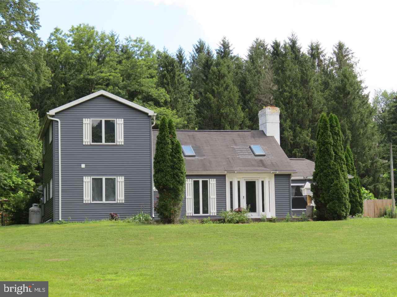 Updated contemporary home in beautiful country setting w/in-ground pool just 15 minutes from RT22. Enjoy granite countertops and soft close cabinets. Cathedral wood ceilings and skylights in main living area. Private master suite is the entire second floor with 2 walk in closets and a generous updated master bath. Family room in back is currently being used as an office but would make an excellent family/great room. GEOTHERMAL HEAT! Home warranty offered. Seller is a licensed Realtor in PA.