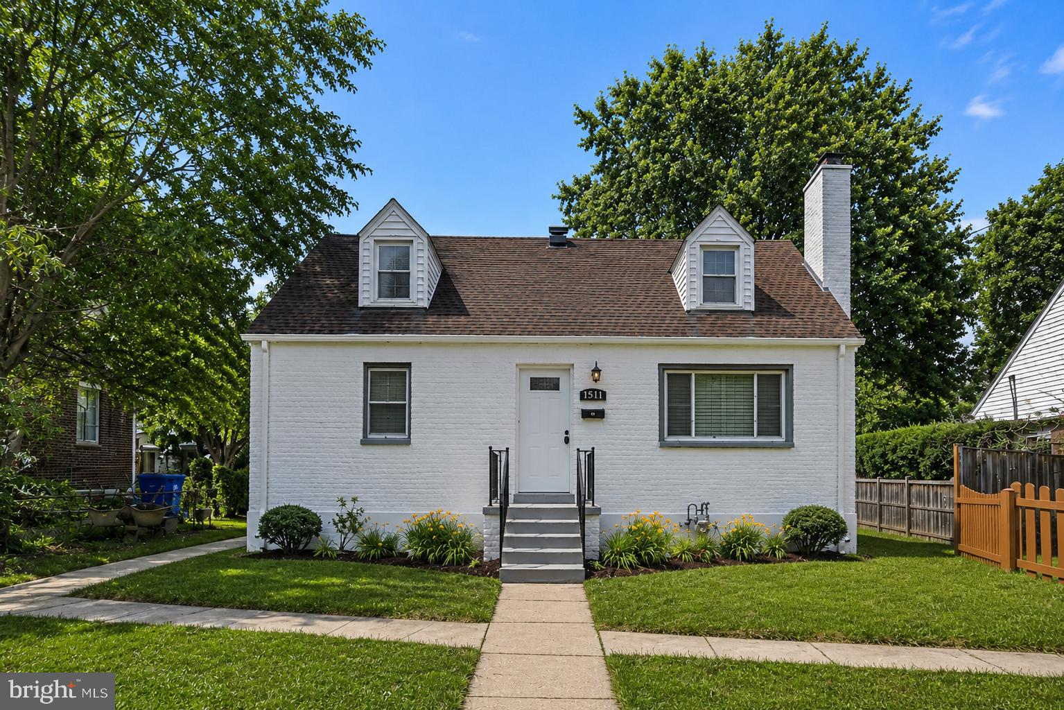 Welcome to 1511 Crest Road, Silver Spring, MD —  a beautifully renovated7 bedroom home plus an independent, fully finished 2 bedroom 1 bathroom basement apartment with a private entrance and full kitchen which includes a proven income of $2,000.  This also includes exceptionally spacious residence offering approximately 3,100 square feet of finished living space with an impressive 7 bedrooms and 4 full bathrooms. Completely renovated and thoughtfully updated throughout, this rare home offers incredible flexibility for large households, multigenerational living, or those seeking abundant living and guest space. The upper-level features 5 generously sized bedrooms, while the main level includes 2 additional bedrooms and convenient full bath access. The fully finished walkout basement offers 2 more bedrooms, a full bathroom, and a washer/dryer unit completely separate creating a private and functional lower-level living area. This also gives owners the ability to rent out separately or even do AirBNB! At the heart of the home is a stunning, fully remodeled kitchen featuring modern cabinetry, updated countertops, stainless steel appliances, and abundant workspace for cooking and entertaining. The kitchen blends contemporary style with everyday functionality. The walk-out basement includes its own separate kitchen, making it ideal for extended family, guests, or additional living flexibility. The home's updated bathrooms have been tastefully renovated with modern fixtures, vanities, tile work, and finishes, providing a clean and luxurious feel throughout. Bright, open living spaces, recessed lighting, updated flooring, and fresh finishes showcase the quality of the recent renovations. Outside, the property continues to impress with recently completed professional landscaping that enhances both curb appeal and outdoor enjoyment. The expansive lot provides plenty of space for entertainment, recreation, gardening, or simply relaxing in a private setting. With major renovations completed, including remodeled kitchens and bathrooms, this move-in ready home offers the perfect combination of size, functionality, and modern updates in a highly convenient Silver Spring location close to shopping, dining, parks, commuter routes, and public transportation, down the street from DC. This house had a major bump out and extension in the rear giving it a lot more square footage. With No HOA, the possibilities are endless! A rare opportunity to own a fully renovated 6-bedroom home with multiple kitchens, a walk-out basement, and exceptional living space—1511 Crest Road is truly one-of-a-kind.