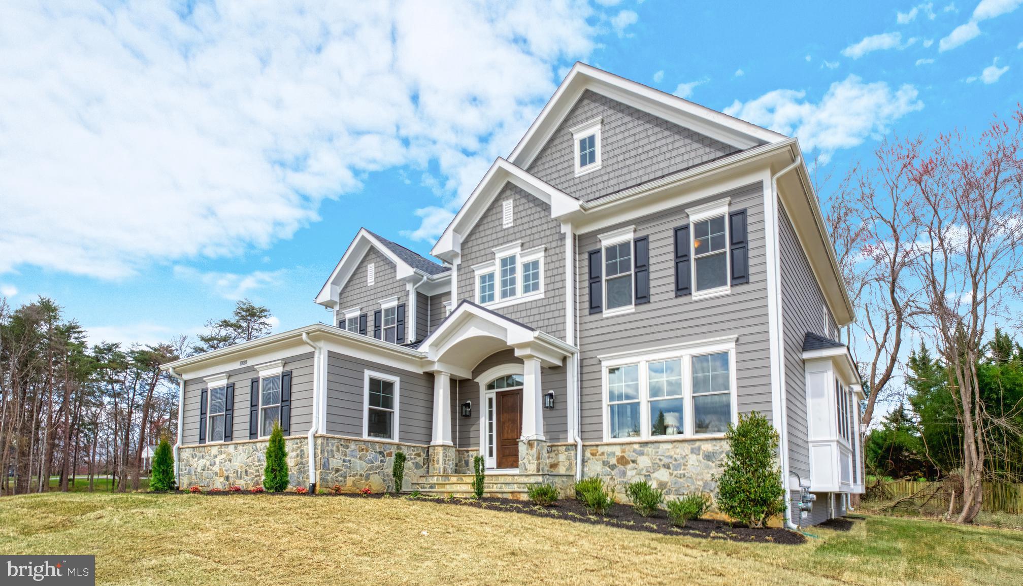 NEW CONSTRUCTION BY SEKAS HOMES.  OVER-SIZED LOT.  BRAND NEW CONSTRUCTION  MOVE-IN NOW!!   SEKAS HOMES PRESENTS THE CHANTICLEER III, THREE LEVELS OF LIVING-SPACE.  THIS CENTER HALL PLAN SHOWCASES ELEGANT BALANCE  IN IT'S FLOW OF WELL THOUGHT-OUT LIVING SPACES.  THE CHANTICLEER III  COMPLIMENTS  TODAY'S FAST-PACED FAMILY THE CHANTICLEER III BY SEKAS HOME.  3 CAR SIDE-LOAD  GARAGE.   BEAUTIFUL LOT WITH TREES .   STUDY  AND DINING AREAS OFF THE FOYER.  THE REAR OF THE HOME OFFERS A LARGE FAMILY-ROOM & KITCHEN WITH A  FIREPLACE  AND UPSCALE CHEFS-INSPIRED  GOURMET KITCHEN WITH KITCHEN-AID APPLIANCE PACKAGE; YOU'LL LOVE TO COOK -IN & ENTERTAIN-IN.   BUTLERS PANTRY WITH UNDERCOUNTER BEVERAGE CENTER ADJACENT TO KITCHEN/NOOK/DINING AREA  GATHERING AREA SCREEN-PORCH OFF THE KITCHEN/NOOK .  9' CEILINGS THREE FLOORS. FAMILY ENTRANCE WITH MUDROOM AND BUILT-IN BENCHES & CUBBIES.  PARTIALLY FENCED REAR YARD EXTRA ADDED LANDSCAPING FRONT AND REAR OF THE YARD.  UPSTAIRS IS  A SPACIOUS PRIMARY SUITE AND THREE LARGE SECONDARY BEDROOMS  FOR KIDS AND GUESTS EACH WITH ITS OWN BATHROOM. UNWIND IN THE OVER-SIZED PRIMARY SUITE SLEEPING AREA ALONG WITH TWO WALK-IN CLOSETS.  THE PRIMARY BATH ITSELF HAS A LUXURIOUS BATH & OVERSIZED SHOWER IN YOUR PRIVATE RETREAT.   THIS IS NEW CONSTRUCTION.  FINISHED LOWER LEVEL WITH RECREATION ROOM AND BEDROOM #5 &  BATH #5 & EXERCISE ROOM.  MOVE-IN NOW!!