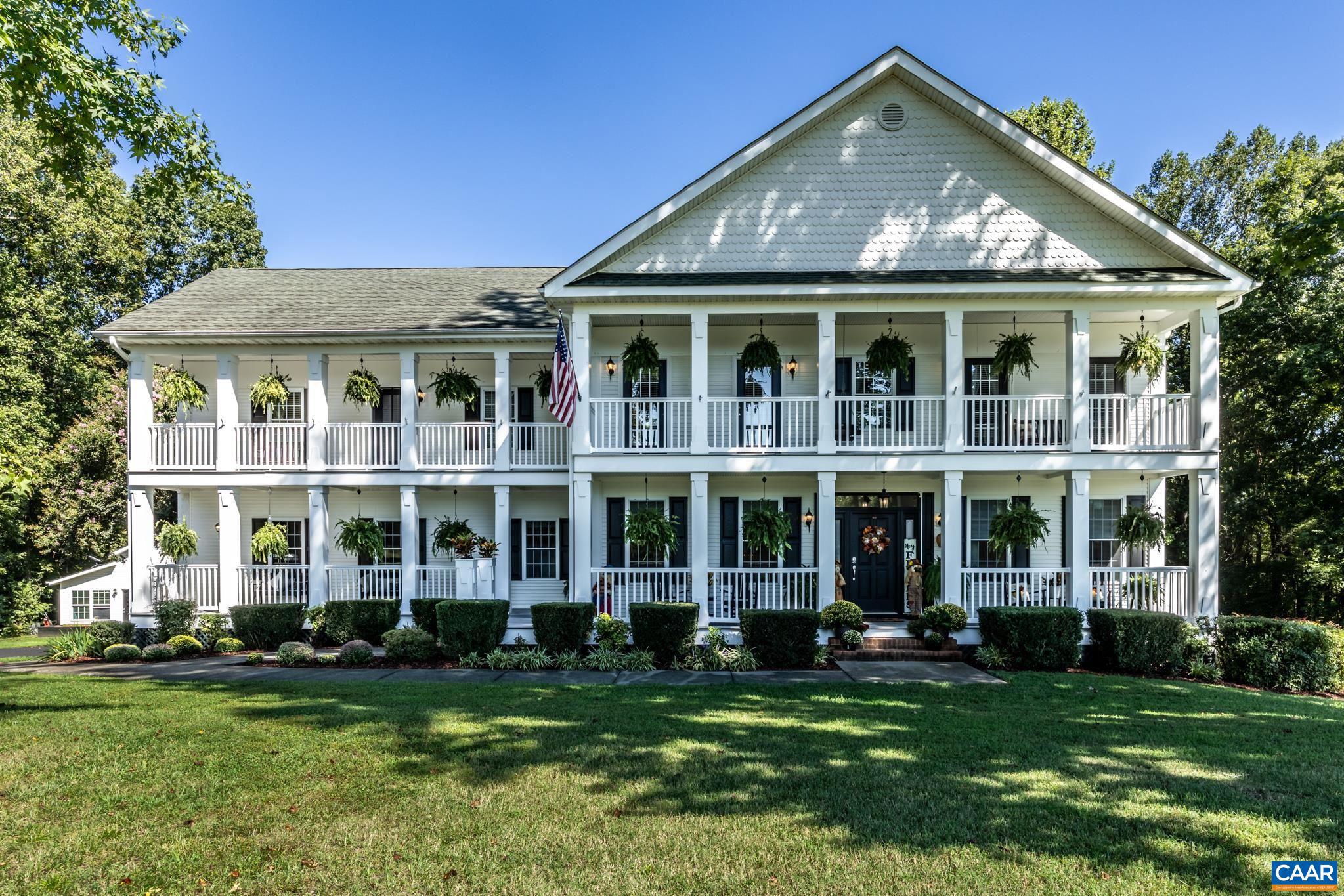 Welcome to a stunning Colonial estate set on 10 private acres in Glen Allen. A gracious front porch and balcony create timeless curb appeal, while manicured grounds frame a sparkling pool, hot tub, pool house, and barn. Inside, soaring ceilings, refined finishes, and light-filled rooms set the stage for elegant living.  The primary suite offers a serene haven with its own private upstairs loft, perfect for a study, yoga retreat, or reading nook. Outdoors, a screened patio and deck with retractable awning invite year-round enjoyment. Three cleared acres are perfect for animals?the current owners keep chickens and goats?while multiple wooded acres provide trails and natural beauty. Designed for both entertaining and everyday comfort, this rare property offers space for animals, entertaining, and peaceful living?all just minutes from Richmond conveniences. This beautiful oasis would not only be an excellent living space but also conducive to short term rentals, weddings, and more.  Schedule your private showing today and experience a lifestyle of elegance and ease.,Fireplace in Living Room