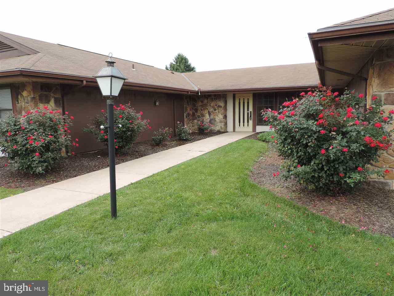 Convenience, Security & Carefree lifestyle! That's what you will find in this well maintained ranch style condo w/spacious open floor plan. Common lobby w/secure entrance, 2 large bedrooms & bath, EIK w/plenty of storage & all appliances included, thermostat in each room for efficiency. New AC unit & washer. French door opens to private patio & storage shed w/new roof.  Assigned parking + extra visitor parking. Close to shopping, dining & Rt 30