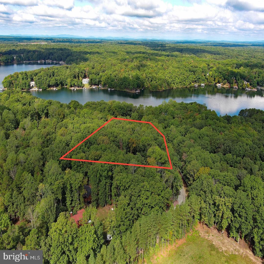 Great location at Lake Anna!  LOT 11 Pleasants Lane is a water-access lot in Seclusion Estates at Lake Anna with No HOA fees and is within walking distance to the common area.  Seclusion Estates is a small private community that offers a beautiful waterfront common area, 2 community piers, and deep water on Contrary Creek.  The lot is currently wooded and has some seasonal water views!  Great mid-lake location on the public side of the lake.  Soil letter in MLS documents and lot will likely take an alternative septic system.  Come see for yourself and build your next home here!
