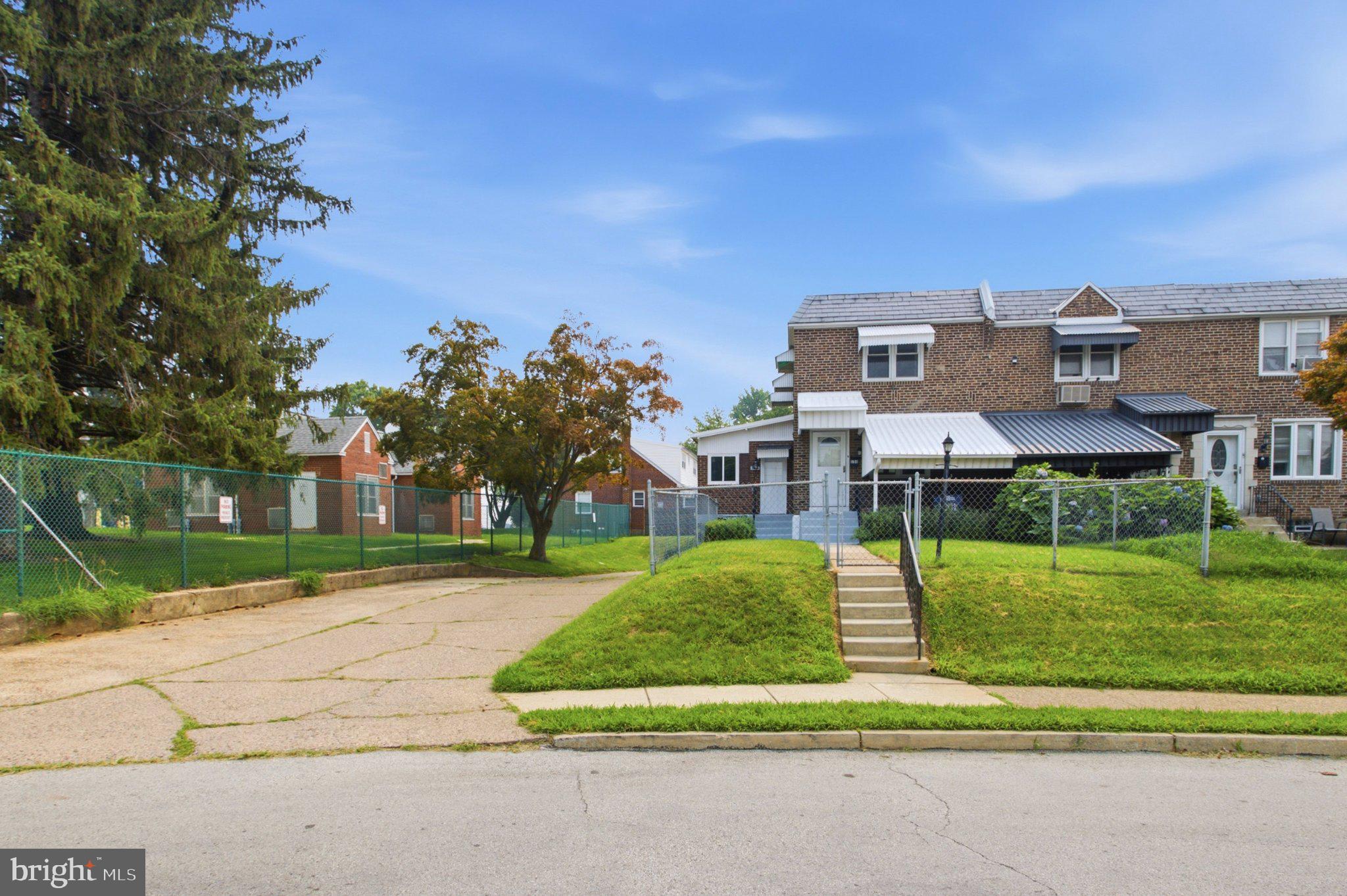 Welcome to 151 Alverstone Rd; a beautifully renovated 3-4 bed, 1.5 bath end-of-row that not only features private parking for 4-5 cars, but also features a rarely-offered, 2-story side-addition with its own private entrance that provides endless possibilities such as creating a 1st floor 4th bedroom, office, family room, kids play room, craft room or just added living space. Additional 1st floor features are a spacious formal living room, formal dining room and an updated, partially opened, kitchen with access to the side addition.  2nd floor features: 3 generously sized bedrooms, all with ample closet space and a beautiful fully tiled center hall bathroom. Lower level features: an updated fully finished basement featuring a half bath, built-in bar, utility/laundry room, storage room & access to the rear yard. Exterior features: 2-car driveway behind home, 3 car driveway on left side of home (next to the alley entrance), covered front porch, fenced in front yard and opened rear yard. Close to community parks, public transportation, local eateries & all major routes make 151 Alverstone Rd an absolute must see! Schedule your appt today!