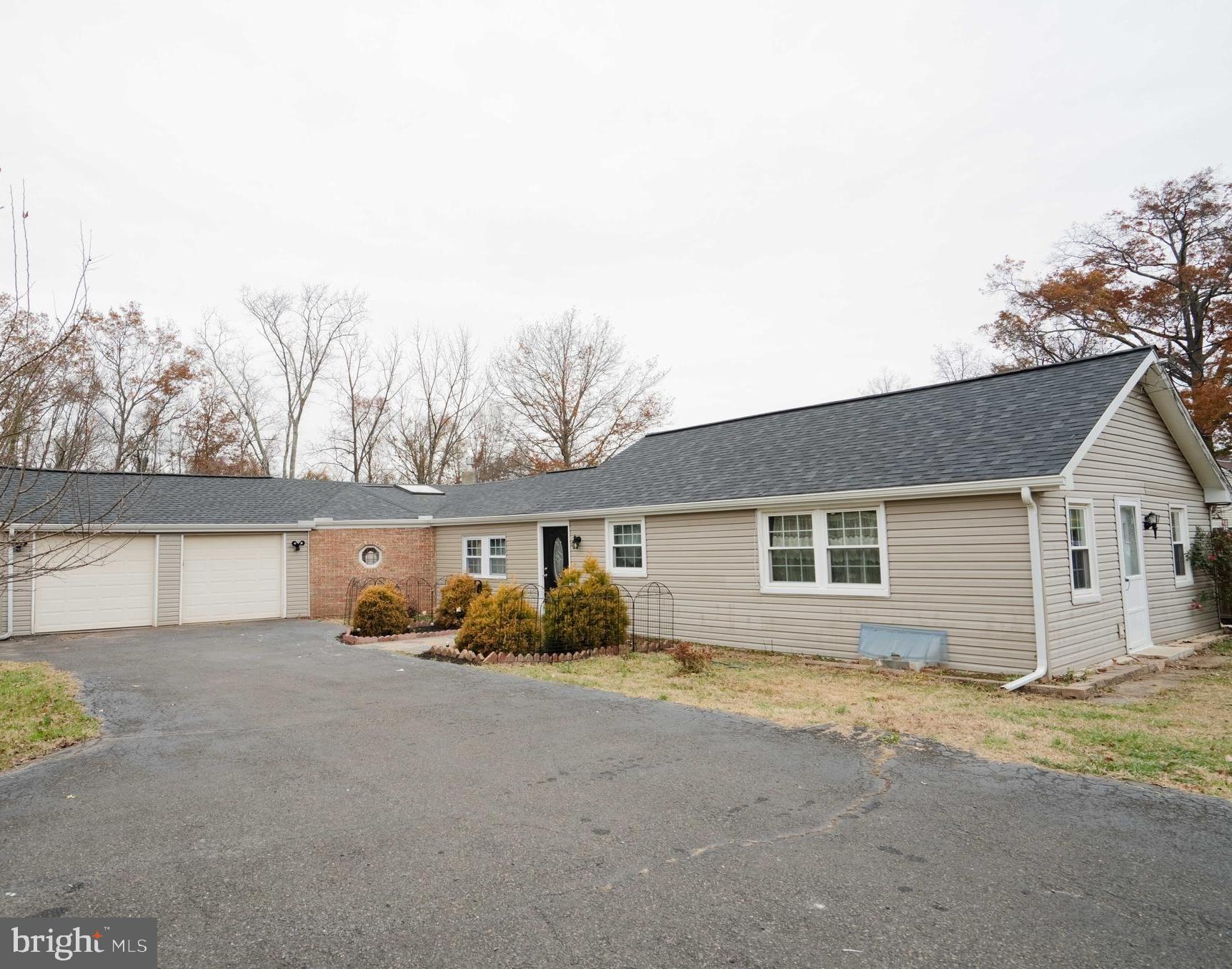 Welcome home to 1606 N Line Street! This beautiful ranch home is located in a desirable area of Lansdale, close to shopping centers, major routes, and within the highly rated North Penn School District. 

This home features numerous updates, including an updated kitchen with newer appliances, renovated bathrooms, fresh paint, new flooring, recessed lighting, and more. Major improvements include a new roof and siding (2021), most windows replaced in 2020, an updated HVAC heat pump (2021), and an updated deck. 
The living room boasts abundant natural light from the windows and front entrance door, creating a bright atmosphere.

The attached two-car garage offers ample space and convenient interior access through the family room. The spacious family room is filled with natural sunlight, creating a warm and inviting atmosphere perfect for relaxation.

Step outside to enjoy the updated deck and nicely sized backyard, offering the perfect space for family gatherings, entertaining, and barbecues.