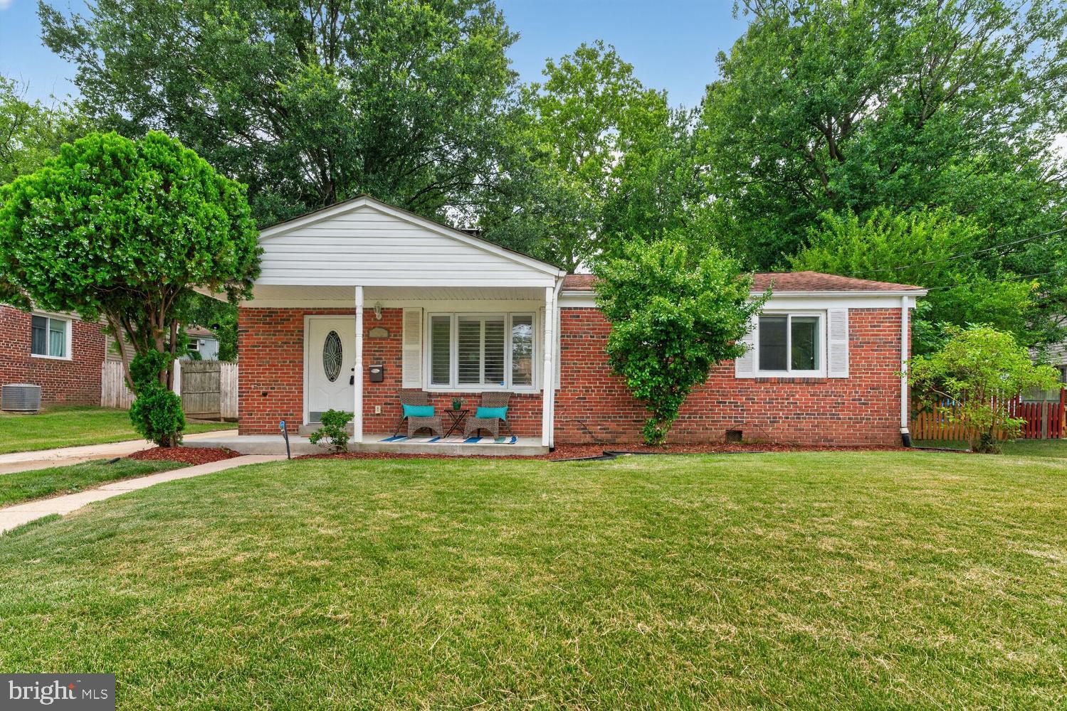 Welcome home to 7304 Wells Boulevard located in the charming University Hills neighborhood of Hyattsville! Here you'll enjoy living in a tree-filled neighborhood lined with sidewalks. Enjoy a variety of global cafes and dining options on Baltimore Avenue in College Park just minutes away. In University Hills you're surrounded by the day-to-day conveniences of Target, CVS, Walgreens, dry cleaners, hardware stores, and more just minutes away. Indoor and outdoor fitness options abound nearby to suit your lifestyle and wellness needs. Soak in the great outdoors at the end of the street at University Hills Park with its playground, picnic pavilion, and scenic pond surrounded by a walking path. There are often ducks, as well as turtles, frogs, herons, and other wildlife! Other paths in the park connect with the trail system along the Northwest Branch of the Anacostia River. Multiple walkable Metrobus options on Adelphi Road, plus nearby College Park Metro Station, make getting around Hyattsville and the Metro area carefree. Multiple thoroughfares to DC and 495 make getting around and out of the Metro area a breeze! 7304 Wells Boulevard offers you suburban charm with the conveniences of city living for the lifestyle you deserve and the best of Metro area living.

Features of this home:
This Ranch Rambler was built in 1950 and beautifully renovated in 2019. It boasts 3 bedrooms and 1 bath spread out over 1066sf. A lovely covered front porch welcomes you home. Upon entering the home, you are greeted with a combined spacious open living room & dining room with a beautiful wood-burning fireplace, recessed lighting, and a large picture window and a 2nd window. A convenient coat closet is located next to the front door. Gorgeous Brazilian Cherry floors flow throughout the main living spaces, hallway, and one of the secondary bedrooms. The living & dining flow seamlessly into the updated kitchen. The kitchen is well-equipped with an abundance of cabinet & pantry storage, expansive countertop space, gas cooking, and light-filled through 2 windows. The home provides multiple bedroom sizes to suit your needs for serene sleeping retreats, guests, a home office, and/or a nursery. The bathroom is beautifully updated with modern ceramic tile, and equipped with a shower/tub, vanity storage, a window, & open linen shelving. The home is complete with an additional storage closet, Central HVAC, in-home washer & dryer, and attic storage. This home sits on almost a quarter of an acre. The fenced-in backyard provides an oasis for an array of outdoor enjoyment of playing, entertaining, relaxing, gardening, and more. Make your home and create the life you deserve at 7304 Wells Boulevard.