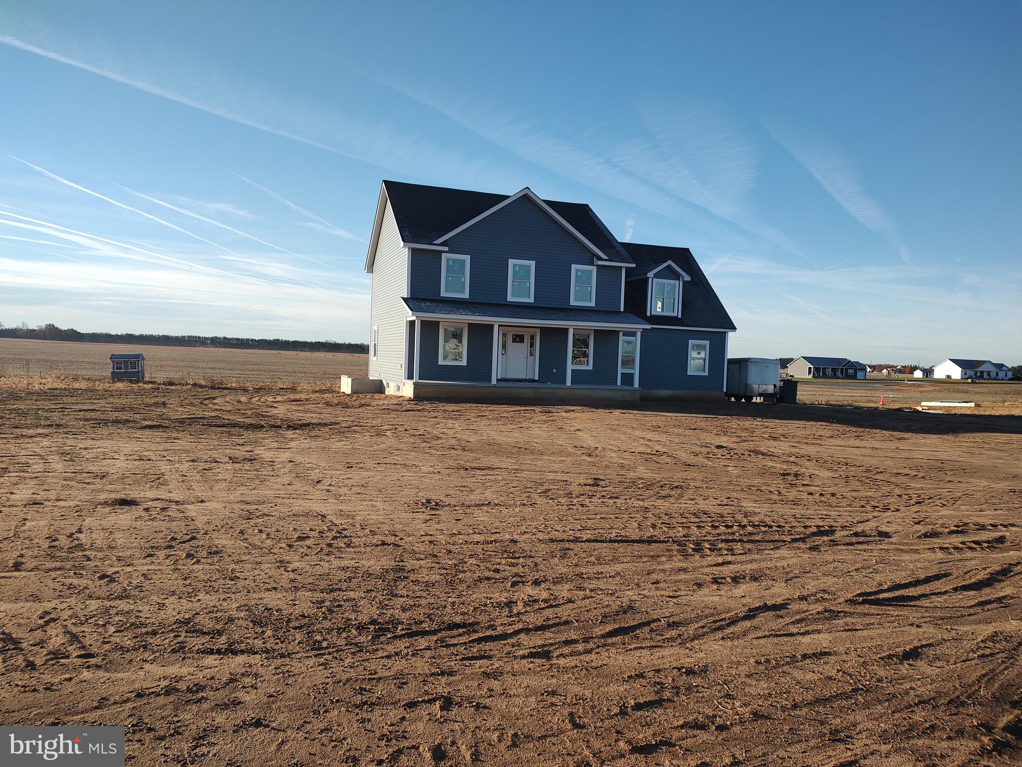 House in picture is to be built. This floor plan is a 3-bedroom   2.5 bath layout.  Finished bonus room upstairs would make great home office or craft room.  Unfinished basement for even more space. Upstairs has a separate laundry room with cabinets and countertop. Large pantry alongside the kitchen perfect for all your supplies and storage. Kitchen has been designed to take full advantage of the open space. Extra-large kitchen island. Backs to farmland with great views. Condor Manor lots are 1 acre each.  Take a ride out there and see
for yourself. This house is to be built.  Approximately   2480 finished square feet.  Unfinished basement approximately 1024 square feet. Buyer would need a construction loan. Buyer pays all docs/trans fees.