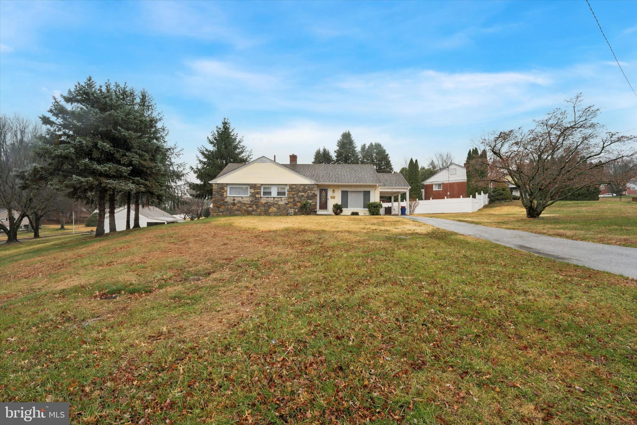 Welcome to this beautifully maintained brick and stone ranch home set on an expansive corner lot offering exceptional space, privacy, and endless possibilities. With large front, side, and rear yards, this property delivers the outdoor room you’ve been searching for.
This home offers single level living with three comfortable bedrooms, nice full hall bath and primary private powder room. The bright eat-in kitchen is ideal for casual meals, and the layout offers a great flow for everyday living.
The unfinished basement provides a clean slate—ready to be transformed into additional living space or whatever suits your needs.
Parking is never an issue with off-street parking for 4+ cars, plus a carport for added convenience.
This home also brings fantastic expansion potential, whether you choose to add a second floor or build out from the side or rear. The solid construction and large lot make these options both realistic and exciting for future growth.  
You’re also close to everything that matters: schools, playgrounds, shopping, restaurants, major highways, and an easy commute to the city. With central air, public water, and public sewer, the essentials are already in place.