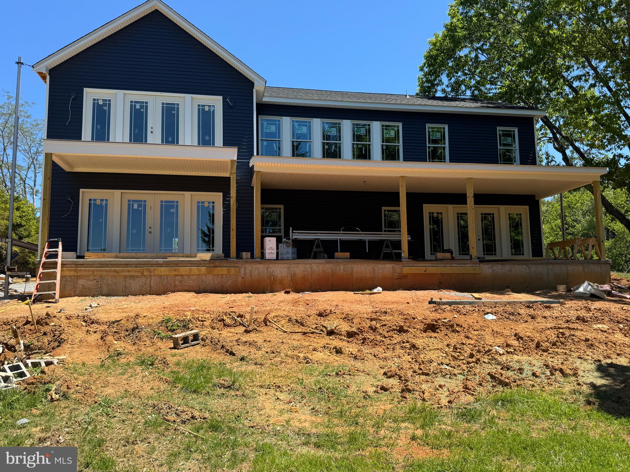Imagine waking up to the sound of a peaceful lake, surrounded by a brand-new lake house! This beautiful 3,300 square foot home is a perfect blend of elegance and tranquility. As you drive up the circular driveway, you'll feel the stress melt away. Open the door to a spacious foyer and look out at the lake through the windows of the great room, which is beautifully situated on either side of the fireplace. The gourmet kitchen is conveniently open to the dining room. French doors in the dining area lead to a covered deck that flows over to the main level's primary bedroom. The main level's primary bedroom has two walk-in closets and an oversized bathroom. Enjoy the view of the lake from the upstairs catwalk.

The second primary bedroom opens to its own private balcony, perfect for enjoying morning coffee or a glass of wine to unwind after a long day. The other wing upstairs has another bedroom and a perfect home office. Take a short walk to the dock to soak in the beauty of Smith Mountain Lake and all its wonders. If you're looking for the perfect lake getaway or envisioning a lakefront BNB, this estate is the perfect fit for you!

Dock has been designed, & seller has initiated the AEP permit process.