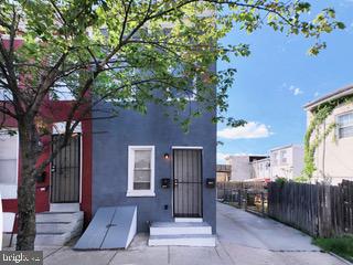 Urban living at its finest in this hip duplex at 1402 Carroll St, Baltimore, MD. This versatile 2-unit property offers a blend of city vibes and investment potential. The property is already licensed, LEAD-FREE and inspected, fully turnkey and cash flowing with a great tenant.

Unit 1: Come into the spacious lofted upper level,  2-bedroom, 1-bathroom unit. Calacatta quartz kitchen with stainless steel appliances and modern designs including exposed spiral ducts and glass shower bathroom. A chic retreat perfect for the city dweller. Enjoy the modern comforts and style in this trendy living space.

Unit 2: This cozy 1-bedroom, 1-bathroom unit is a minimalist's dream and is already rented to a long-term, great, paying tenant – talk about a hassle-free investment opportunity! Cash flowing on day one!

Shared Laundry Room: The shared laundry room has been fully updated, saving you the time and effort of trekking to the laundromat. Convenience at your fingertips.

This home a fantastic place to live in the heart of the city, but it's also a golden investment opportunity. The one-bedroom unit's long-term tenant means you can start generating rental income immediately .

Invest in Baltimore's thriving real estate market and watch your wealth grow while enjoying the cosmopolitan lifestyle. Whether you're looking for your new home or a smart investment, this duplex has it all.

Don't let this opportunity slip away – act now and own your piece of Baltimore's vibrant landscape!
