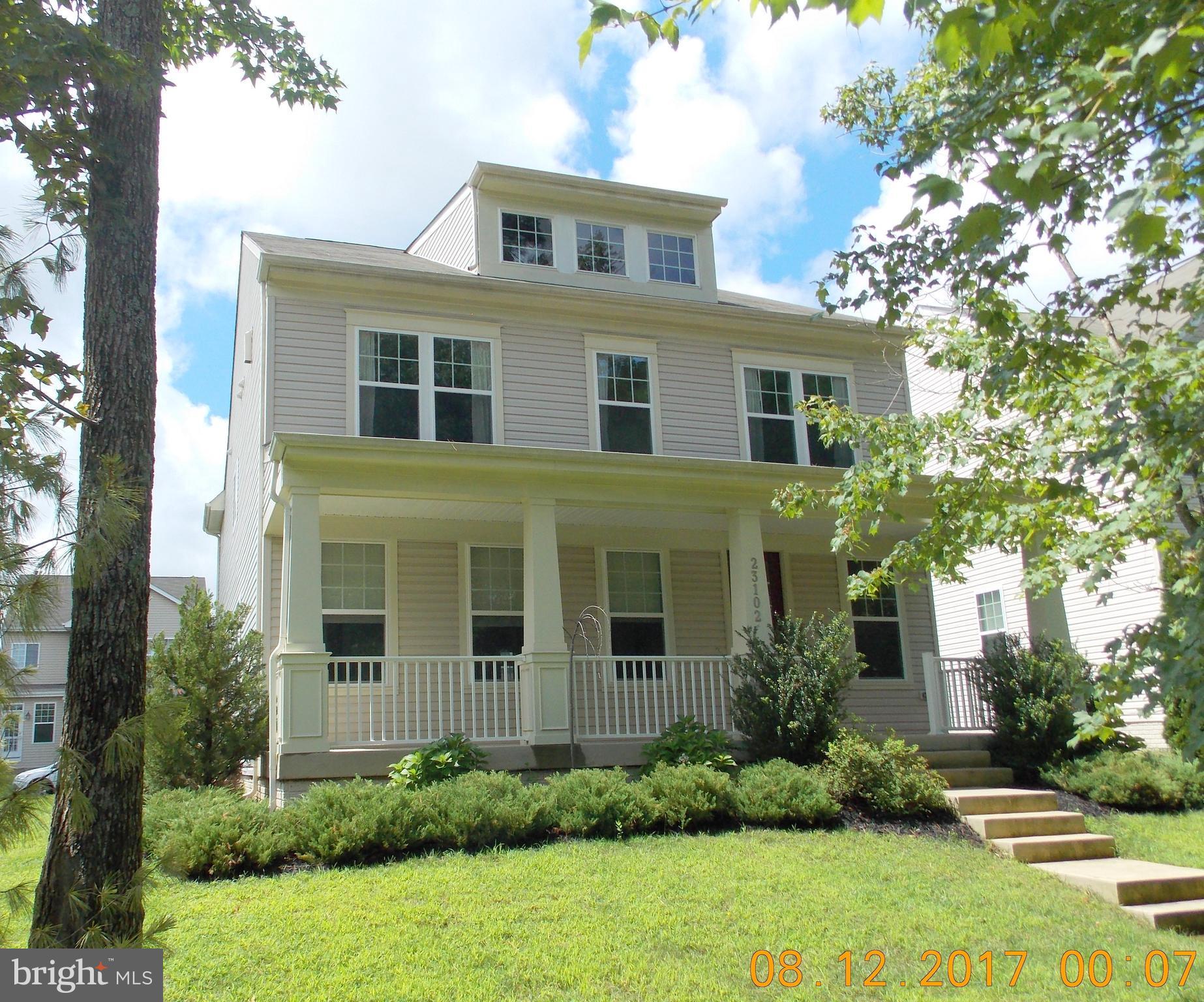 Wonderful large 4 bedrm, 4 1/2 bath home w  rear-load garage. Welcoming full front porch surrounded by trees. Spacious, contemp open floor plan, w gourmet kit - granite, stainless, eating space! Lg Fam Rm & Sep DR on main level, second Fam Rm on LL w full bath & tons of storage. Master Suite w 2 walk-ins. Community with Pool, & many amenities. Close to PAX, Shopping, Movie Theatre and Elem school.