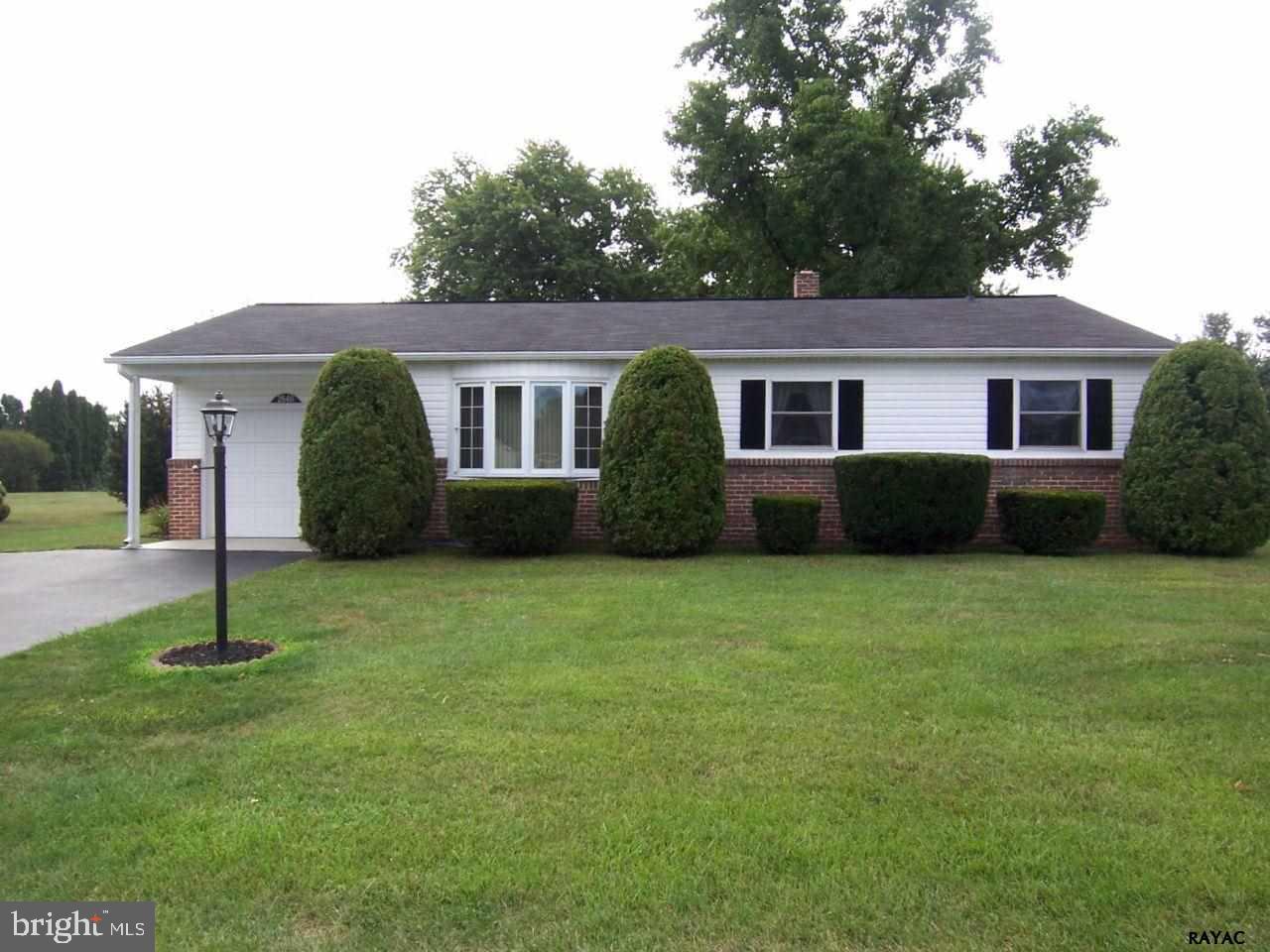 Very neat & clean maintenance free rancher in quiet community in Dover Schools.  Ppty has all new replac vinyl windows, large Bear structure shed, deck, neutral carpeting, partial fin bsmt w/dry bar, workshop, 1 car garage, 1st flr LAU w/addtl hookup in bsmt, Scale Ban for water, mature landscaping and more! Well loved single owner property!  1 yr AHS warranty!