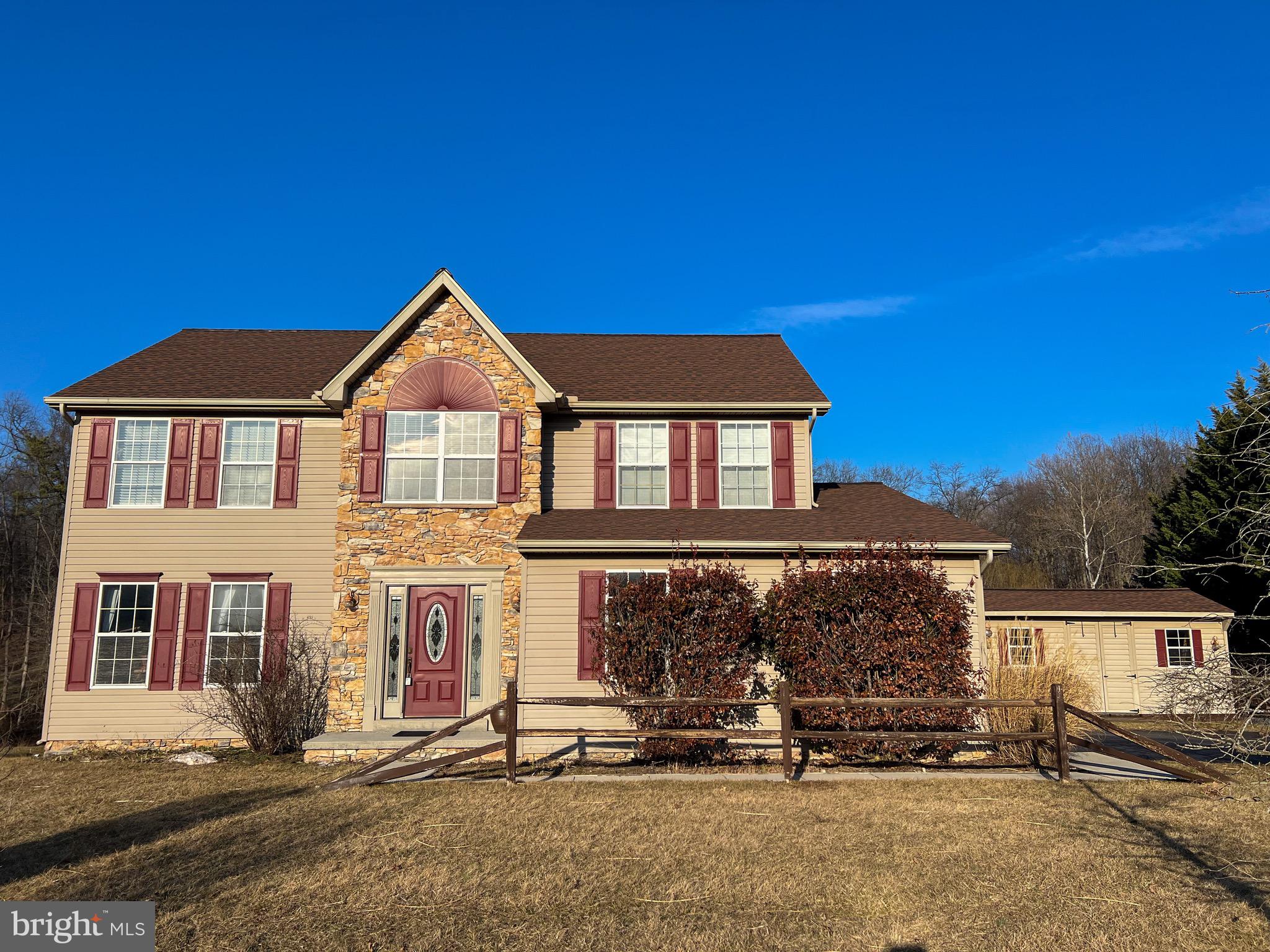 ***NEW PRICE ALERT!!! This beautiful home just got better!!! Schedule a showing before someone grabs this deal!!!*** Seller is offering a SELECT HOME WARRANTY PLATINUM PLAN!
Picture yourself standing on the spacious deck. Breathe in the crisp, clean air as you take in the stunning view of 2.13 private acres stretching before you. Feel your worries melt away as you watch the natural beauty of the landscape, teeming with life. Listen to the gentle rustle of the trees, the cheerful songs of birds, and the occasional glimpse of deer and other wildlife passing by.  A natural gas hookup on the deck eliminates the need for propane tanks, making outdoor entertaining a little easier. This serene retreat offers you peace, privacy, and a connection to nature—your personal sanctuary awaits. Featuring 4 spacious bedrooms and 2 ½ bathrooms, oversized 2 car garage, and first floor laundry room, this home offers the perfect blend of comfort and functionality. The primary suite offers a cathedral ceiling, 12'by 6' walk in closet, and roomy bathroom with a relaxing spa tub. The open floor plan invites you in, with a large eat-in kitchen at its heart. Imagine preparing meals while gazing out through the expansive windows, which offer a stunning view of the yard and natural surroundings. The kitchen flows seamlessly into the cozy living room, complete with a charming fireplace that sets the perfect mood for relaxing evenings or gatherings with loved ones. This home combines thoughtful design and warmth, making it the ideal retreat for everyday living. Take advantage of the spacious walk-out basement, offering endless possibilities to customize the space to suit your lifestyle. With plenty of room for a home gym, you'll have the convenience of working out without ever leaving home. Need a spot for hobbies or projects? There's ample space for a fully equipped workshop, making this the perfect area to combine productivity and recreation. The basement's direct access to the outdoors adds versatility, creating a seamless extension of your living space.  No need to worry about radon as a radon mitigation system has been installed already. Don't miss the opportunity to make this incredible property your own! Schedule a showing today and take the first step toward turning this house into your home.
