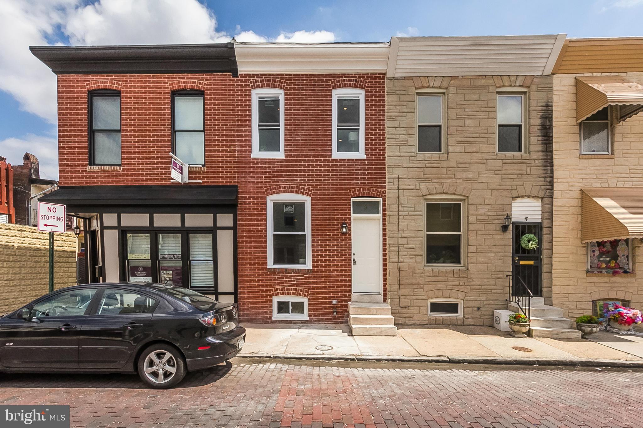 Stunning renovation a block from Patterson Park. 3 bed/3 bath with tray ceilings, custom cabinetry, granite in Kitchen, Master Bathroom with custom marble countertops and a spa type shower.  Fully finished basement with a bedroom,bath and rec room.  Large 1 car parking pad in rear. Enjoy all Patterson Park has to offer with this beautiful renovation.