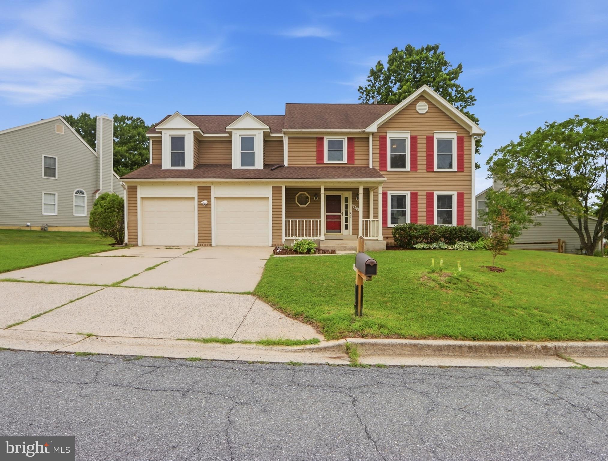Welcome to this turn-key, meticulously maintained colonial in the highly sought-after Germantown Estates neighborhood. From the moment you step into the soaring two-story foyer, you'll notice the bright, open-concept flow designed for modern living. The main level transitions beautifully from elegant formal living and dining rooms into the kitchen. Nearby, the dramatic family room steals the show with vaulted ceilings, fireplace and skylights that wash the space in natural light. Step out from either room onto your private deck overseeing a lovely backyard. Upstairs, the primary suite offers a true sanctuary with high ceilings, an en-suite bath, and fantastic closet space, accompanied by three additional bright bedrooms and an  hall bath. The fully finished lower level adds incredible versatility with a large recreation room, a full bath, and a flexible bonus bedroom perfect for guests or a home office. With an entire house fresh coat of paint  newer roof, windows, skylights, pipes, water heater and garage doors, this home is entirely worry-free. Combined with an ideal location close to the Blue Ribbon Ronald McNair Elementary, I-270, shopping, and dining, this home truly has it all. Book your showing now!!!