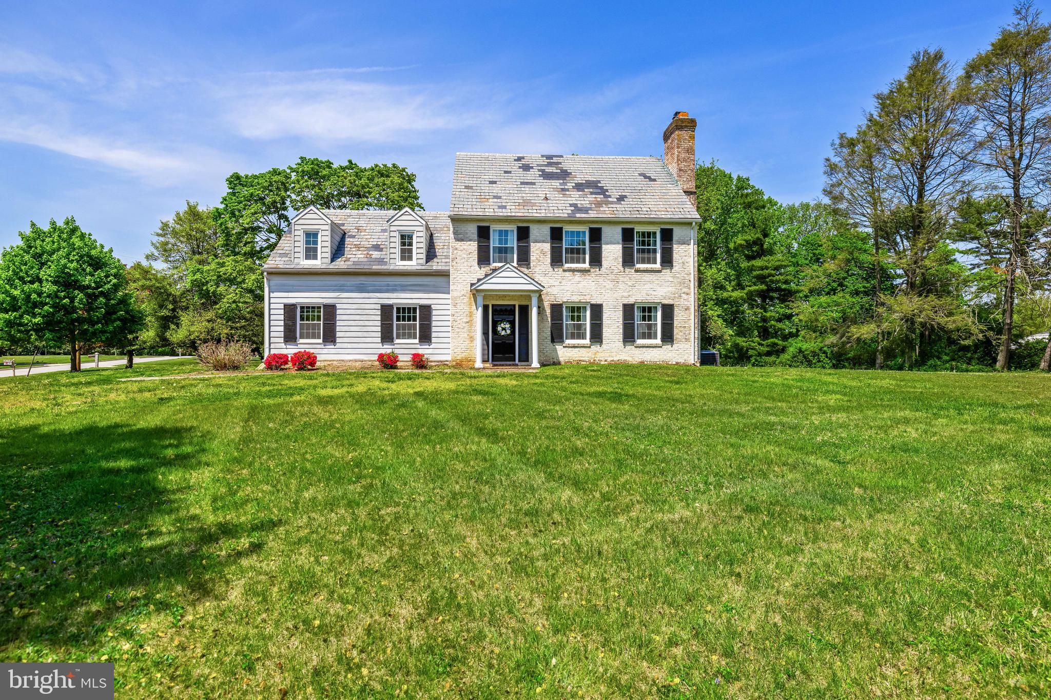 Sitting at the very top of Summer Hill located on a large flat corner lot you will find this super charming 4 bedroom colonial. The home features an open modern kitchen and family room, separate dining room and living room (with a wood burning fireplace) and a screened in porch off the rear. Upstairs are 4 updated bedrooms with 2 baths (including a primary suite). The basement is unfinished by perfect for storage or could be finished if a new owner desired to have the extra rec room space.

The exterior yard is large and flat, surrounded by mature trees and landscaping. The community pool is a short walk down the street and is available for membership to neighbors. Come see all that Summer Hill has to offer an schedule a showing ASAP!