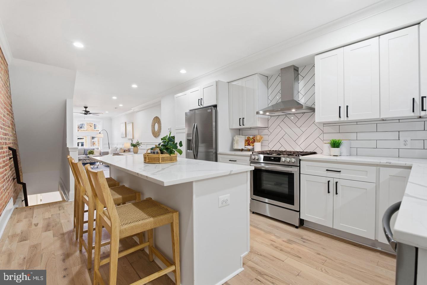 **CURRENTLY PHOTOS ARE SAMPLES FROM ANOTHER RENOVATION THIS BUILDER RECENTLY SOLD. FINISHES AND LAYOUT IS ALMOST EXACT**
The finishing touches are underway on this stunning, brand-new CHAP renovation in the heart of Canton! Soon you’ll be able to walk through and experience what a true full-gut renovation looks like. The main level features brand-new hardwood floors, exposed brick, a timeless white gourmet kitchen with island and breakfast bar, custom trim, and a convenient half bath—making it both stylish and functional.
Upstairs, the second level offers a spacious primary suite, an additional bedroom, a second full bath, laundry, and access to the roof deck. The fully finished basement adds even more living space with two additional bedrooms and a third full bath—perfect for guests, a home office, or flexible living needs.
This home truly checks all the boxes with its blend of modern design and everyday practicality. Out back, you’ll find easy off-street parking. Plus, the significant tax savings that come with CHAP renovations make this an especially smart investment.
Enjoy the best of Canton living—just a short walk to Patterson Park or down to the waterfront. The neighborhood is packed with nightlife, restaurants, sports, and more, all with convenient access to Johns Hopkins, I-895, I-95, I-83, and BWI Airport.
