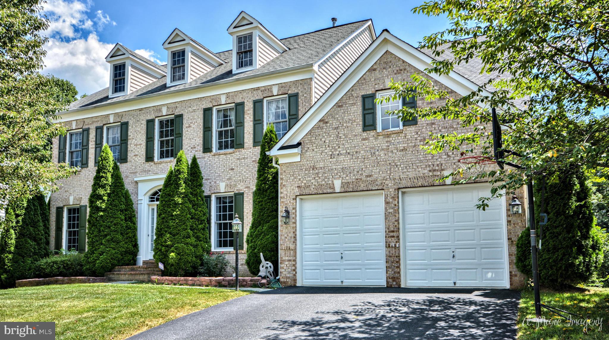 IMPRESSIVE BRICKFRONT 4000 + SQ. FT HOME  LOTS OF EXTRAS INCLUDING CUSTOM BUILT-INS. CUSTOM STONE FIREPLACE IN FAMILY RM, HARDWOOD FLOORS ON 1ST LEVEL, DOUBLE STAIRCASE, BUTLERS PANTRY, MAIN LEVEL OFFICE, 4 LARGE BDRMS INCLUDING BONUS ROOM, SPACIOUS OWNERS SUITE W/LUXURY BATH, 2 JACK & JILL BATHROOMS, FINISHED WALK/OUT BASEMENT/FULL BATH, ENJOY TWO LEVEL DECK THAT BACKS TO WOODS - CALL ALTERNATE !