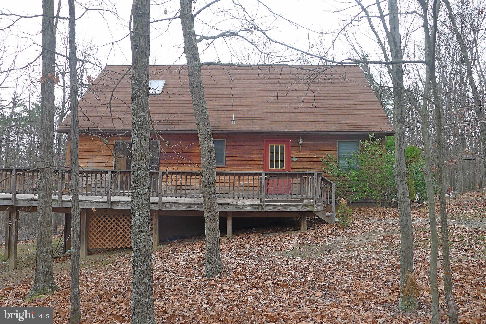 Contract fell thru--frozen pipes so home needs some repair. Appraised in current condition at $134K. Perfect Get-A-Way-Cozy and Private in wooded setting on 6.37 acres. Great layout with big mstr BR upstairs w/sitting area and private bath. Other 2 BRs + full bath downstairs. Great property-Worth the effort. Bank approved price--should be quick.