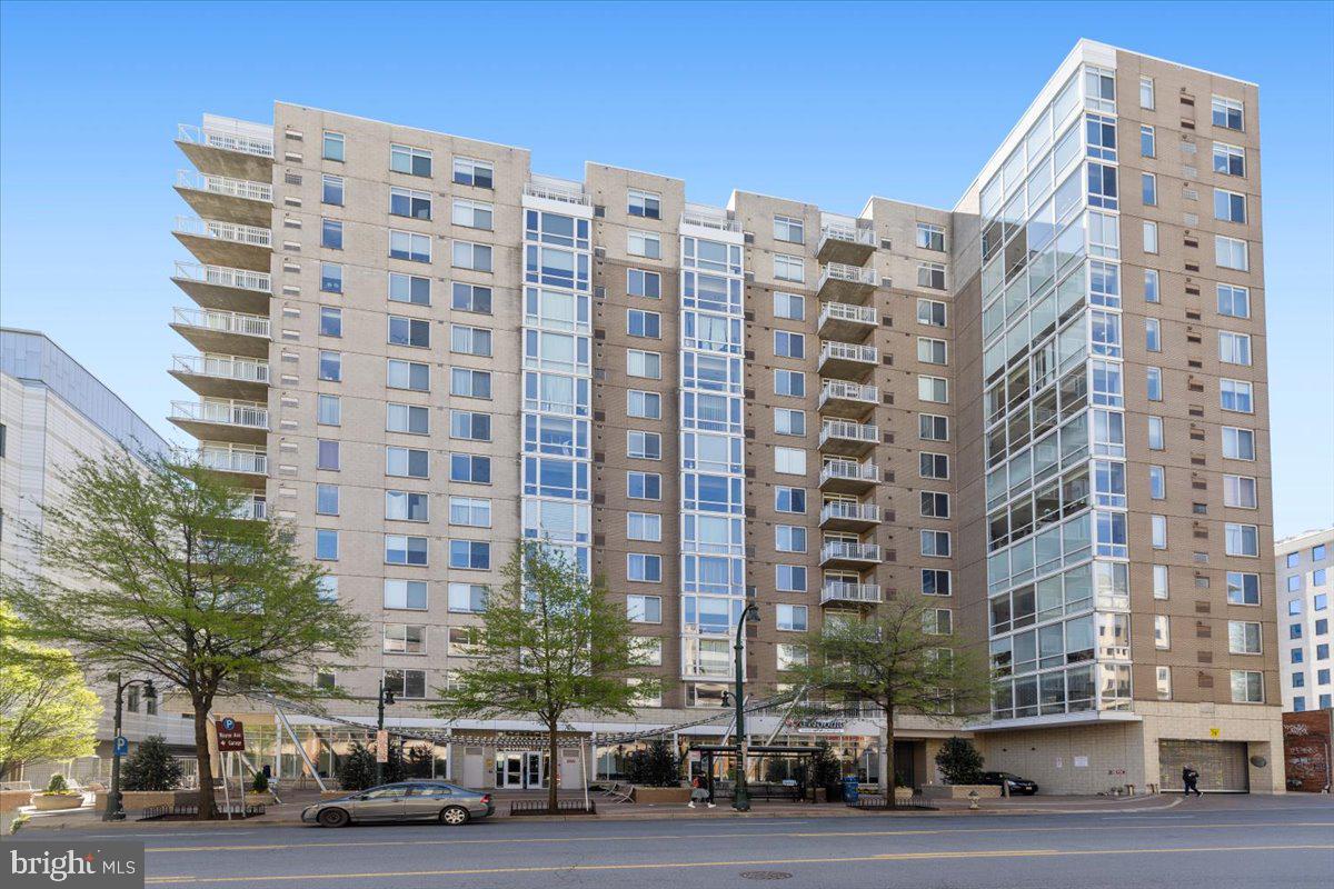 Set in a vibrant and well-connected corner of Downtown Silver Spring, this corner residence at the Crescent offers a lifestyle that feels both effortless and invigorating. Floor-to-ceiling windows fill the home with natural light throughout the day, creating a bright and airy atmosphere whether you're easing into the morning or relaxing at the end of the day.

The layout flows seamlessly from the sunlit living area, highlighted by newly installed hardwood floors, into a well-appointed kitchen with granite countertops and stainless steel appliances. The primary suite serves as a peaceful retreat with a spacious walk-in closet, an additional closet, and a private bath, while the second bedroom and full bath provide versatility for guests, a home office, or both.

Life here extends far beyond your front door. Step outside and enjoy one of the most vibrant and convenient neighborhoods in the DC area, with restaurants, grocery stores, coffee shops, and entertainment just moments away. Whether you're heading out for dinner, catching a film at the AFI, or taking the Metro into DC from a few blocks away, everything is within easy reach. The soon-completion of the Purple Line, with a station located at the library next door, will make commuting by rail even easier. For days you prefer to drive, the covered garage parking space is ideally located near the elevator for added convenience.

The Crescent adds to the experience with a pet-friendly atmosphere and amenities that make everyday living easy, including an on-site manager, fitness center, billiard room, and resident lounge. Regular community events foster a welcoming sense of connection and bring neighbors together in a way that makes city living feel surprisingly personal.

This is a home where comfort, convenience, and community come together in the heart of Downtown Silver Spring.