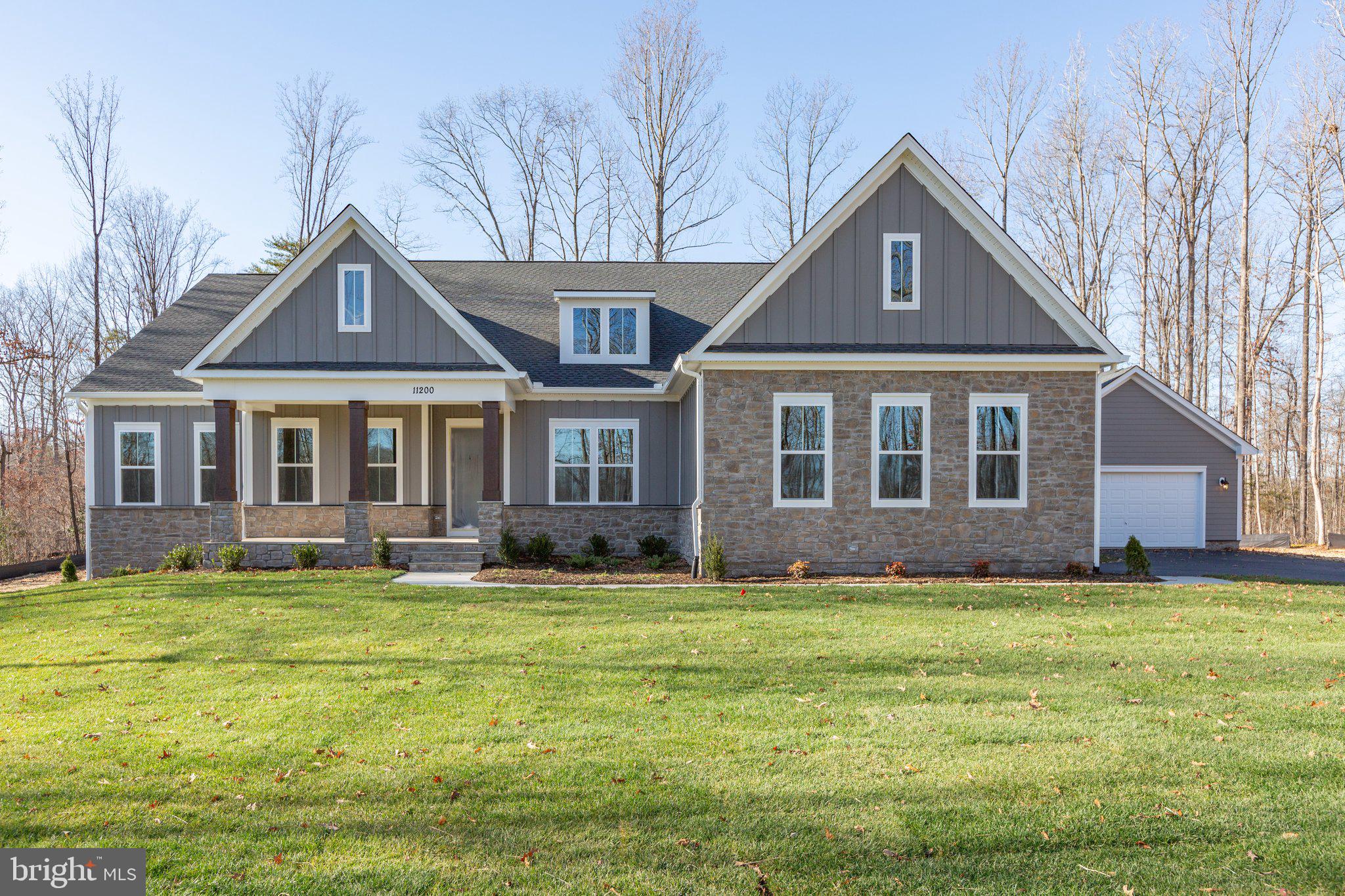 Windhaven Woods is the next great Nokesville neighborhood by Atlantic Builders. This beautiful new community of 10-acre homesites is located just off of Fitzwater Drive (Rt. 652) just west of Rt. 28. There's plenty of shopping, restaurants and recreation opportunities located just minutes away in Bristow and Gainesville. 

Atlantic Builders' newest Main Level Living home, the Torrey offers 4 bedrooms, 3.5 baths in 3,420 square feet. This exciting new home is a one-of-a-kind in this market and features the choice of 3 gorgeous exterior elevations including Craftsman, Modern Farmhouse and Transitional architectural styles. With a ton of living space on one level, the Torrey has an amazing open layout that encompasses a spacious great room, 10' main level ceilings, expansive gourmet kitchen with oversized island and a separate breakfast area that adjoins the included covered rear porch. AND there's a large study and formal dining room that provide more separate/private spaces in this home. 

The best feature of the Torrey is that all 4 bedrooms are on the main level. A luxurious and private owner's suite includes a deluxe bathroom with plenty of room for both a large shower as well as the opportunity to add a free standing tub. And a stunning walk-in closet completes this peaceful retreat. The opposite side of the home is dedicated to 3 additional, generous sized bedrooms with a jack n' jill bath between bedrooms 2 and 3 and an ensuite bath for bedroom 4.  

The lower level offers an opportunity to add even more space to this already very large home. Optional rec room, exercise room, den/bedroom, full bath and media room can increase the size of the Torrey another 2,200+ square feet. 
Home comes included with a 2-car side load garage with option for 3rd along with up to a 3-car detached garage!

Please note that renderings and photos shown may feature optional features that are not included in the base house.