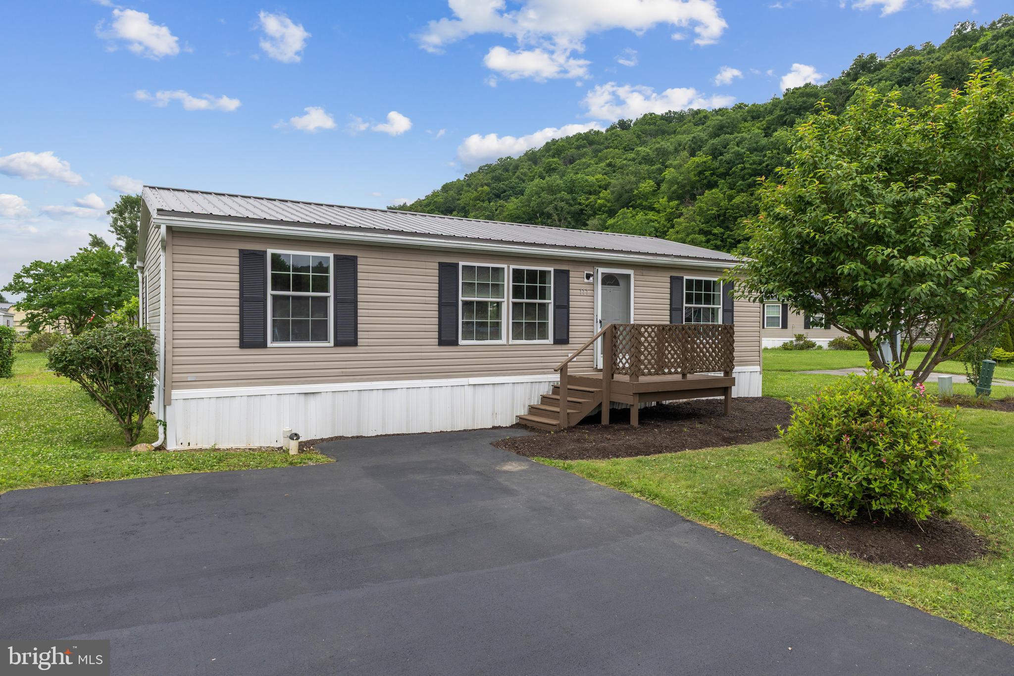 Welcome to 117 Cherokee Court, Julian, PA Discover easy one-floor living in this well-maintained 3-bedroom, 2-bath manufactured home situated on a spacious .82-acre lot in the Elk Creek community. Step inside to find beautiful updated luxury vinyl plank flooring throughout, creating a fresh and modern feel. The comfortable floor plan offers inviting living spaces, a functional kitchen, and the convenience of everything you need on one level. Outside, enjoy a flat, usable yard with plenty of space for outdoor enjoyment, or simply relaxing and taking in the peaceful Central Pennsylvania setting. Conveniently located with access to State College, Bellefonte, and Mill Hall, while also being close to Foster Joseph Sayers Dam and nearby outdoor recreation opportunities, including hiking, biking, fishing, boating, and more. A wonderful opportunity to enjoy the comfort, convenience, and outdoor lifestyle that Central PA has to offer. Records indicate that title does not exist, Buyer to check with lender.