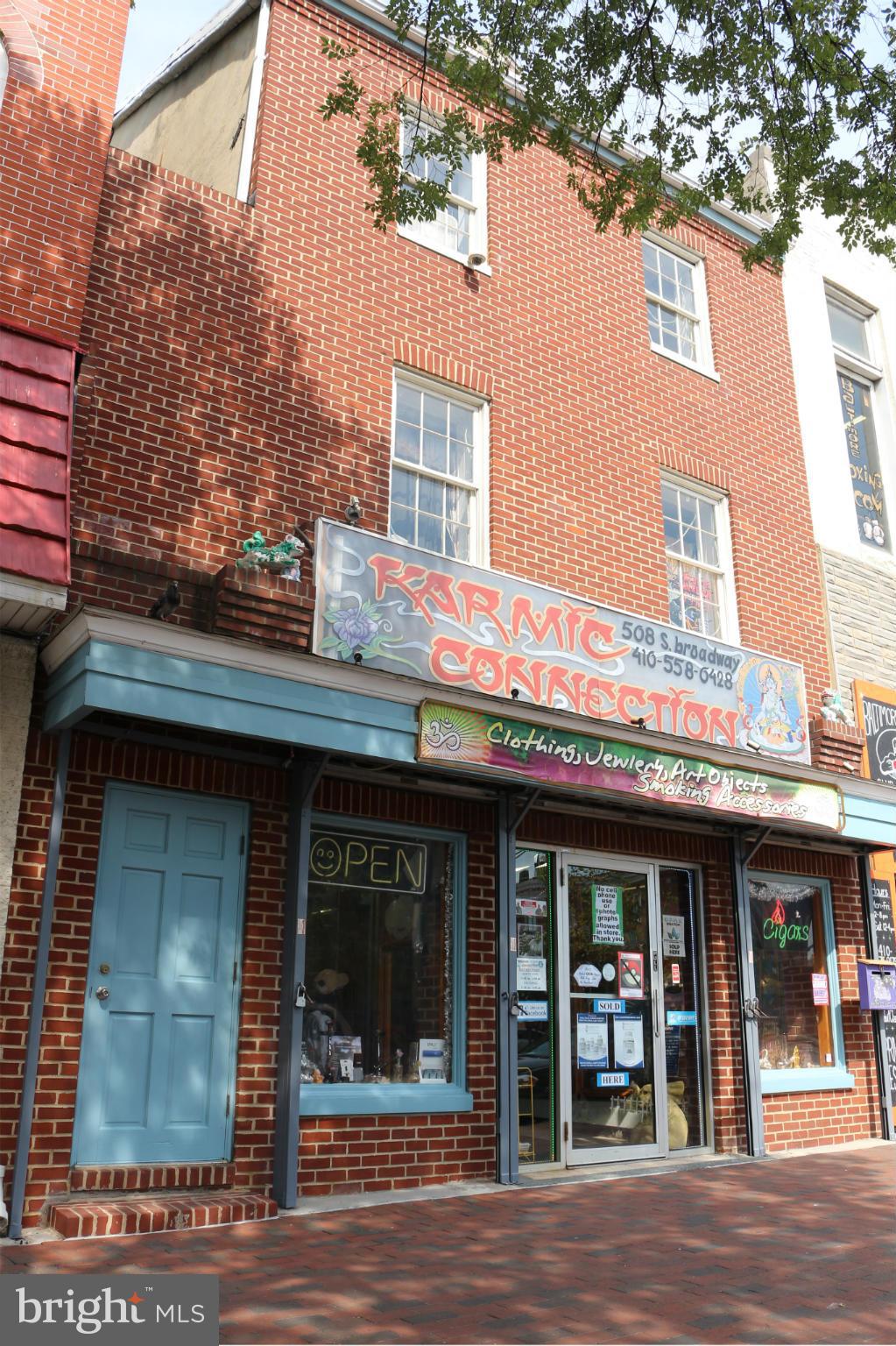 C-1 zoned 2 unit retail building on bustling Broadway 1/4 block from the fells point market.  Approx. 3500 SF.  Each unit has its own separate retail entrance on Broadway.  Unit 1 is street level retail that takes up the majority of the lot.  2 large window displays capture foot traffic.  Retail display cases, office furnishings, safe, and all furnishings, fixtures, and equipment convey.  Unit 2 encompasses the three upper levels and has a separate entrance facing Broadway's foot traffic and is built out as a wellness center / massage studio with several treatment rooms.  Property is sold strictly AS-IS / WHERE-IS.