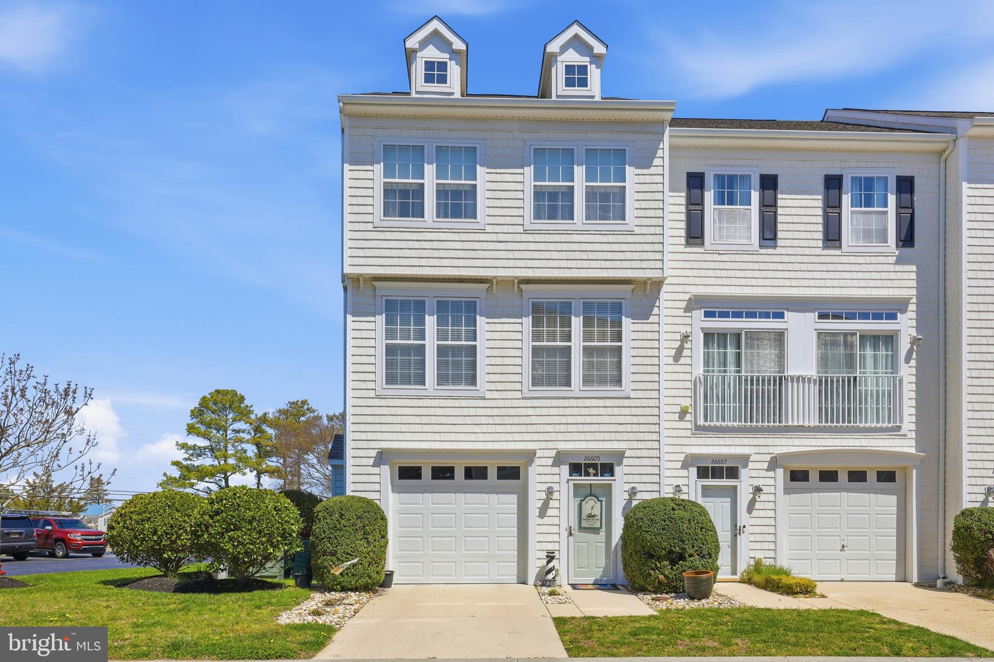Welcome to easy coastal living in the desirable community of Fairfield at Long Neck! This well-maintained 3-bedroom, 2.5-bath end-unit townhome offers low-maintenance comfort and a bright, open layout perfect for everyday living and entertaining. Step inside to find durable engineered hardwood  flooring throughout the main living areas, designed for both style and easy upkeep. The spacious interior flows seamlessly, creating an inviting atmosphere filled with natural light. During ownership, the carpeting in the bedrooms and stairways has been updated, adding a fresh and comfortable touch. The oversized garage provides ample storage space and includes a convenient utility sink—ideal for projects, cleanups, or beach-day gear. Enjoy peaceful evenings on your private deck, perfect for relaxing or hosting guests. Recent updates include a roof replacement completed by the association, giving added peace of mind. Residents of Fairfield at Long Neck enjoy fantastic community amenities, including a pool, kiddie pool, pool house, and a first-come, first-served boat storage area. Ideally located just minutes from Rehoboth Bay, local restaurants, and scenic walking paths, this home offers the perfect blend of convenience and a relaxed coastal lifestyle. Don’t miss your opportunity to own a slice of coastal charm!