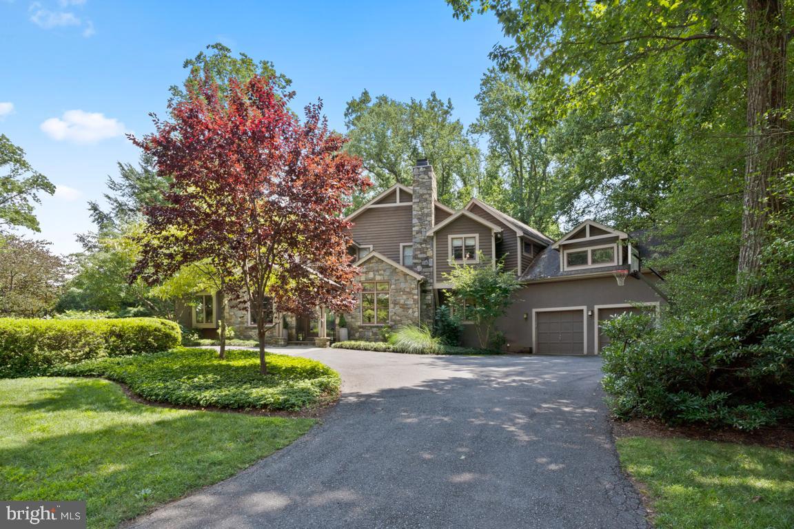 Incredible, Tastefully-Renovated, Contemporary Arts & Crafts 7,000 sqft home on the Best Lot in Bethesda!  Dramatic Entry Welcomes with Soaring Ceilings and Open Concept Living. Main Level features Living Room with Beautiful Stone Surround Fireplace,  Two-Story Family Room with Fireplace Opening to Deck and Majestic Views of Back Yard, Updated Gourmet Kitchen with White Cabinets, Dacor & Kitchen Aid Appliances Island with Gas Cooktop, Homework Desk and Breakfast Nook.  Gorgeous Formal Dining Room for Entertaining, Main Level Bedroom with Full Bath, Main Level Laundry, and Spacious Office.Upper Level features Owner's Suite with Completely Renovated Stunning Bath, Sitting Room/2nd Office, Three Additional Generously-Sized Bedrooms and Two Additional Renovated Baths including Marble Floors, Quartz Counters, and Frameless Shower.  Fully-Walkout, Sunlit Lower Level Features Game Room/Rec Room, Additional Bedroom & Full Bath, Wine Cellar with Tasting Area, Fitness Room, Storage and More and Walks out to The Best Back Yard Bethesda Has to Offer.  Stunning Dual Level Flagstone Terraces and Stone Walls overlook Mature Trees for Utmost Privacy.  Outdoor Stone Fireplace New Built-In New Infrared Grill, and Professional Lighting will feel like Boulder, Colorado, minutes from DC. Two-Car Garage and Circular Driveway for Plenty of Guest Parking, and Whole House Generator! Over 7,000 sqft finished living area with 6 Bedrooms, 5.5 Baths, 4 Fireplaces, and $100's of Thousands just recently invested into upgrades and updates in this one-of-a-kind property, located in Hillmead minutes to Downtown Bethesda and surrounded by many $5-10M homes.