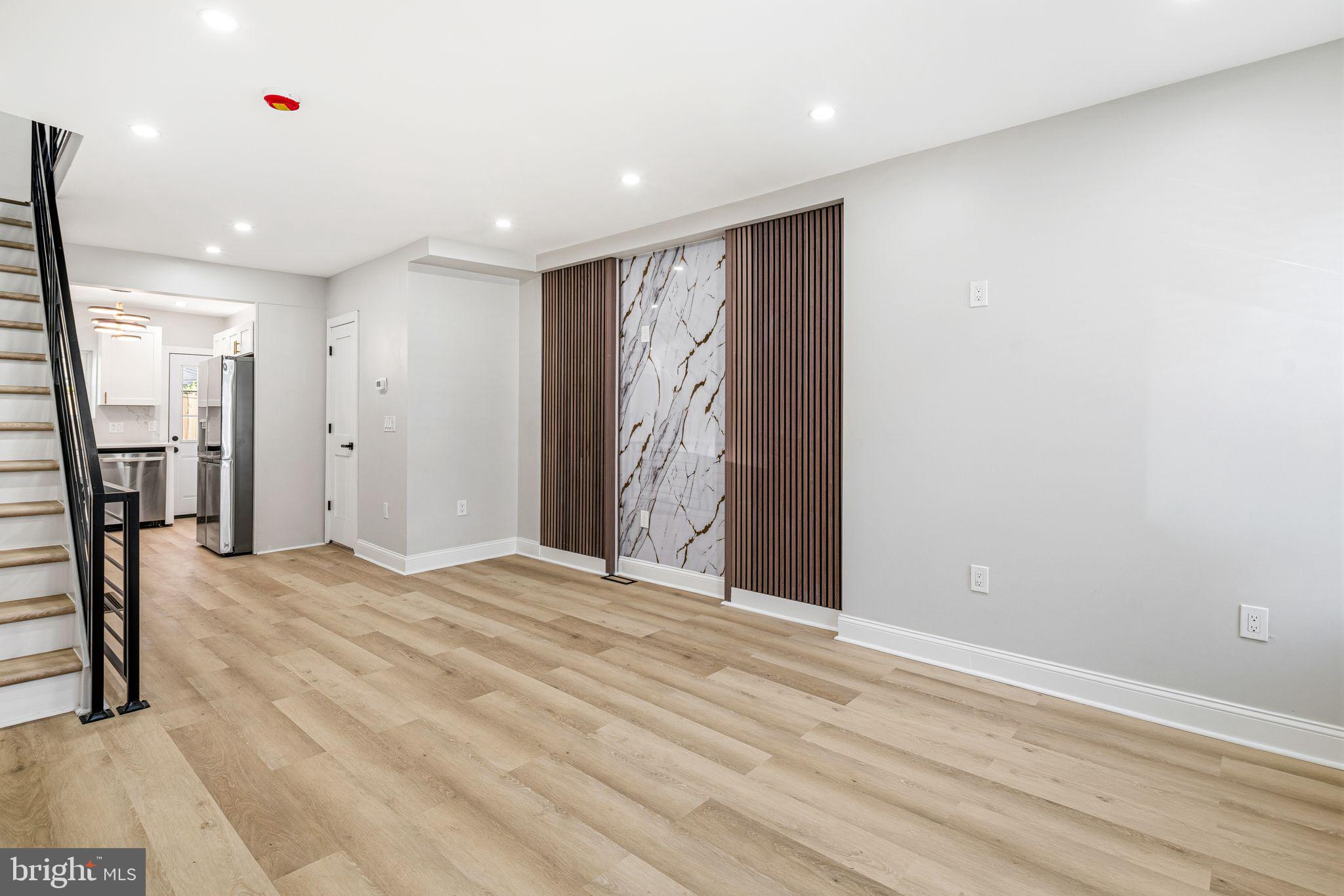 Welcome to 2040 Fernon Street, a beautifully renovated gem nestled in the heart of Point Breeze in Philadelphia. This stylish 2-bedroom, 2.5-bath home offers the perfect blend of modern comfort and city living. Step inside to a bright, open straight-through layout featuring recessed lighting throughout and a seamless flow from the living area to the sleek, updated kitchen, complete with brand new stainless steel appliances. Just beyond, you’ll find a fenced-in backyard—ideal for relaxing or entertaining—along with a convenient half bath on the main level. Upstairs, two generously sized bedrooms provide ample space, complemented by a beautifully designed full bath and the added convenience of in-unit laundry. The finished basement expands your living options, perfect for a home office, gym, or additional lounge space.

Living in Point Breeze means enjoying one of Philadelphia’s fastest-growing and most vibrant neighborhoods. You’re just minutes from local favorites like Wharton Square Park, American Sardine Bar, and Dock Street Brewery South, as well as easy access to Center City, public transportation, and major highways. With its strong sense of community, exciting dining scene, and ongoing development, Point Breeze offers an incredible opportunity to enjoy urban living at its finest.