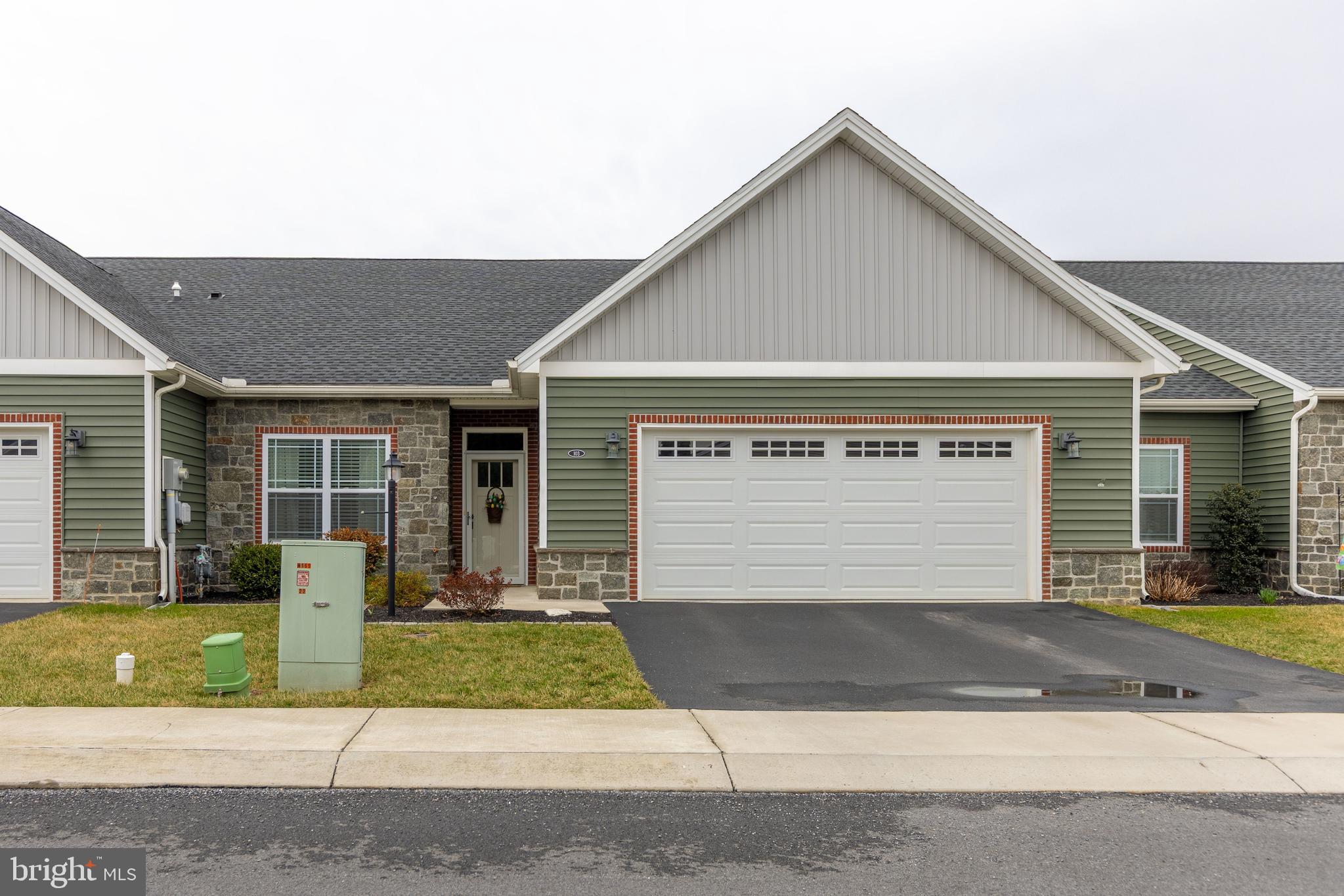 Welcome to convenient and luxury living located at 103 Cardinal Avenue! This home built in 2020 has been meticulously maintained and provides convenient one level living.  Featuring an open floor plan with spacious living areas, this 2-bedroom, 2.5-bathroom property is move in ready for those who are looking for a new place to call home. Each bedroom features a private bathroom and abundant walk-in closet space.  Additional space at the front of the home could be used for an office or converted into a third bedroom.  Setting this property apart from the others in the neighborhood, the back yard opens directly into the community common area allowing quick access to walk your dog or entertain your guests.  The sellers expanded the patio providing ample space to gather or relax. Other features include updated storm doors, accessible hallways/doorways, a fire suppression system, sound proofing between the units, and a 2-car garage. Located in a peaceful neighborhood, this home also offers easy access to local shopping, amenities, and dining. Don't miss out on the opportunity for easily maintainable living, reach out for your private showing today!