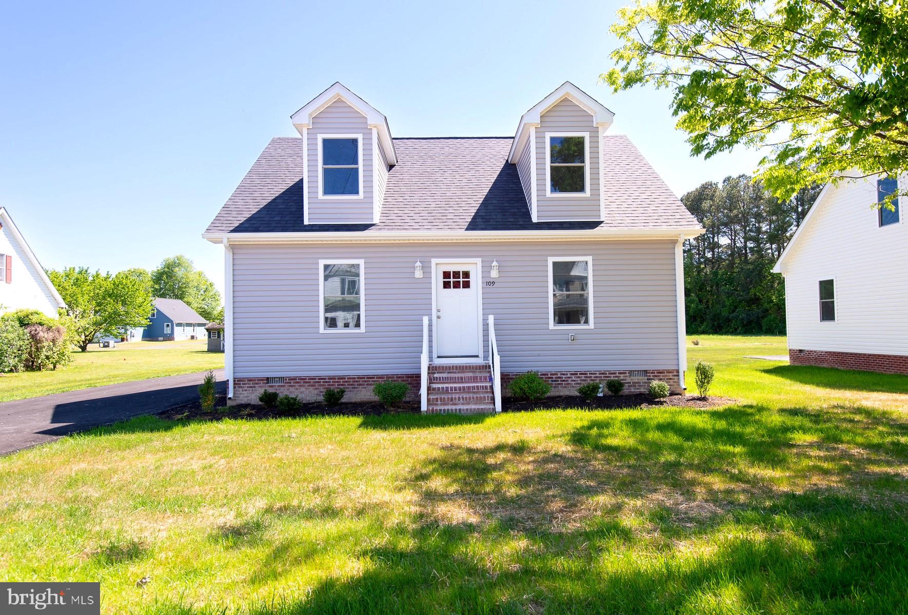 New Construction & Move-in Ready: Your Charming Cape Cod Retreat Awaits in Historic East New Market! Discover this newly constructed three-bedroom, two-and-a-half-bath Cape Cod nestled in the picturesque town of East New Market. This home combines modern amenities with classic charm, offering an inviting atmosphere perfect for both relaxation and entertaining. Step inside to an open layout that flows seamlessly from room to room. The spacious kitchen features elegant quartz countertops, 42-inch cabinets, and sleek stainless steel appliances, making it a chef's dream. The dining area overlooks a generous family room, creating an ideal setting for gatherings and celebrations with friends and family. Convenience meets comfort with the owner’s suite located on the first floor. This tranquil retreat boasts a spacious bedroom adorned with a tray ceiling, recessed lighting, and ample closet space. The en-suite bathroom is a luxurious haven, featuring a quartz vanity and a roomy shower that enhances your daily routine. Just off the family room, a well-placed half bath offers added convenience for guests, while the laundry room down the hall ensures that chores are a breeze. As you ascend the stairs, you'll find another full bath at the top, beautifully finished with quartz countertops. Two additional guest bedrooms flank this bathroom, providing privacy and comfort for visitors. Each bedroom is thoughtfully designed with extra storage space, combining functionality with style. Located within the highly regarded Warwick School District and just a short stroll from Friendship Park, this home is perfectly situated to enjoy both community and nature. Don’t miss the opportunity to make this beautiful Cape Cod your own—schedule a viewing today and experience the charm for yourself!