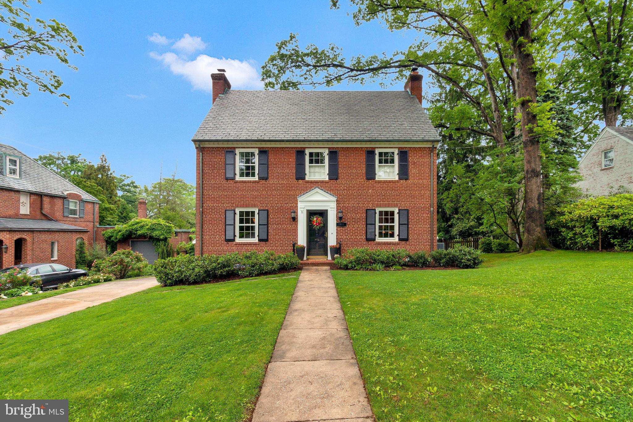 Open House, Sunday -2-4pm. Welcome to this timeless center hall Colonial in sought-after Chevy Chase, MD. From the moment you arrive, you'll be charmed by the lush front garden and the gracious entry foyer, complete with a coat closet and a wide, formal staircase.

The home’s classic layout offers a comfortable flow, beginning with a spacious living room with a wood-burning fireplace and new French doors leading to a cozy study or music room. The formal dining room is ideal for entertaining, showcasing two beautifully refurbished corner display cabinets. It opens seamlessly into the kitchen with stainless steel appliances, granite countertops, and a convenient side door for easy access to the driveway and one-car garage.

Crown moulding throughout the main level adds an elegant touch, as well as a charming powder room.

Upstairs, the generous primary suite includes a luxurious en suite bath with double vanities, a glass-enclosed shower, and a walk-in closet. Two additional spacious corner bedrooms and a full hall bath provide ample space for family or guests. The fully finished third level has been thoughtfully renovated to include a fourth bedroom and a flexible bonus room—perfect for an office, playroom, or additional storage.

The lower level offers even more living space with a large recreation featuring a fireplace. There’s a mudroom with cubbies for storage, laundry area, plus a second office, and a full bath.

Outside, enjoy a beautifully landscaped and fully fenced backyard with plenty of green space, and a patio area that's perfect for grilling and relaxing. The paver driveway leads to a one-car garage, ideal for parking or additional storage.

This home offers the perfect blend of classic Colonial charm and the space and versatility today's lifestyle demands.  Floor plan measurements  completed by a 3rd Party (3477Sqft. )