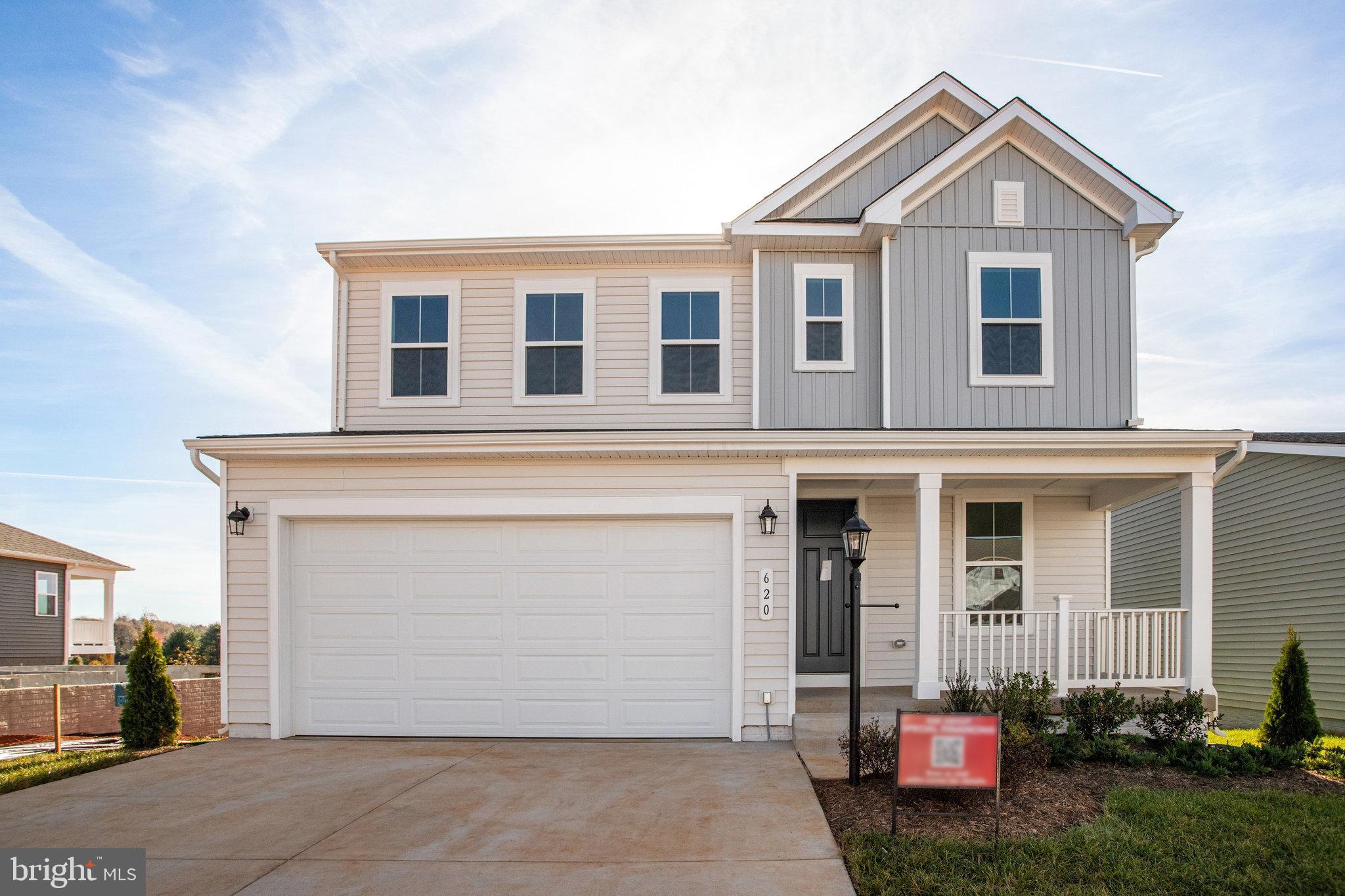 ASK ABOUT SPECIAL FINANCING! $0 down payment USDA financing eligible! This Lapis by Richmond American is move-in ready now!!  There's a lot to love about the Lapis floor plan! The charming front porch leads to an inviting, open layout. Walking through the front door is an open flex room, and an elegant open rail oak staircase. Beyond that is the main living space. The kitchen with a center island and large walk-in pantry flows into a dining room and a great room boasting an Allusion electric fireplace, completed with a center-meet sliding door. Upstairs, the primary suite offers a full private bath and a generously sized walk-in closet. Adjacent are two additional bedrooms, each with their own walk-in closets. The second level loft has been converted into a fourth bedroom. Curated finishes round out this home such as quartz countertops, Aristokraft Quill cabinets, 7” Bellbrook LVP floors on the main level, and timeless stainless-steel light and plumbing fixtures. Welcome to Round Hill Meadows in Orange! Residents will appreciate the small-town charm as well as the conveniences of being close to routes 15, 522 and 3, award-winning wineries, Lake Anna State Park, Lake Orange and the Rapidan River nearby for fishing, swimming, kayaking and boating! Model is OPEN but visitors are encouraged to call ahead to be guaranteed a dedicated appointment.