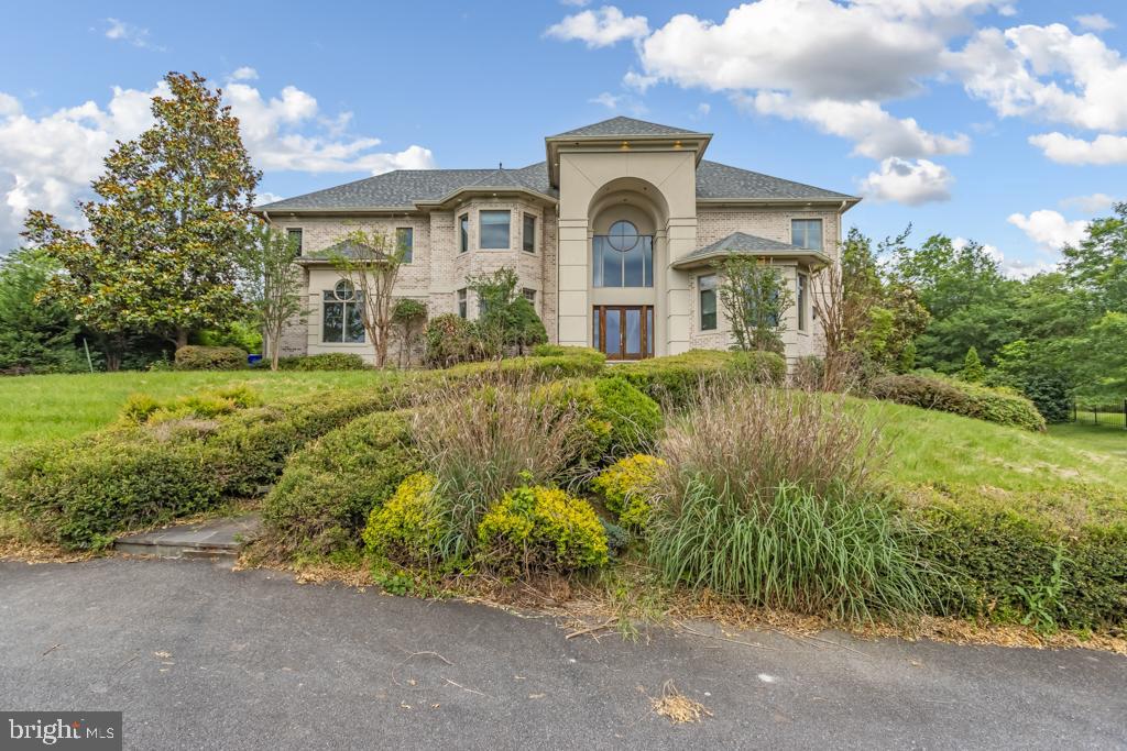 Experience luxury living in this expansive detached colonial, boasting nearly 12,000 square feet of living space on a private 2-acre lot. This magnificent property features a one-car garage on the main level and a two-car garage on the lower level, ensuring ample parking and convenience.

The home offers an in-ground pool and a covered patio, perfect for relaxation and entertaining. The stunning foyer welcomes you into a space filled with elegance, leading to a grand two-story family room, open kitchen, and a living room. With 6 bedrooms, 6 full baths, and 2 powder rooms, there is plenty of room for family and guests.

Additional highlights include an open kitchen, spacious mudroom, a main level bedroom, and a library. The full basement is equipped with a bedroom, gym, and media room, providing versatile spaces for various needs.

Seize the incredible value this property offers, providing an unparalleled opportunity to customize and transform it into your dream luxury residence.