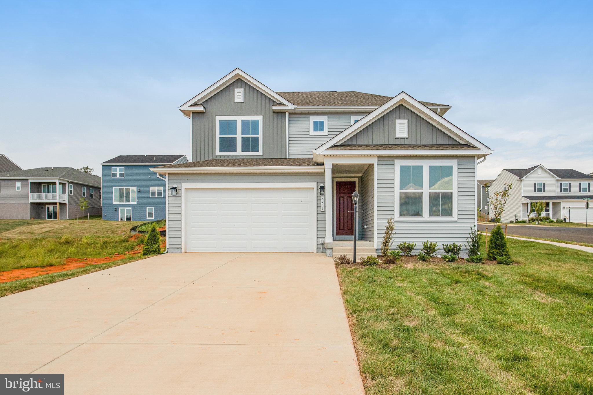 $0 down payment USDA financing eligible! Move-in ready !Imagine your life in the two-story Citrine plan. Breakfast at the spacious kitchen island or in the adjacent dining room. Host a movie night in the inviting great room. Gathering with friends and family for a BBQ on the large covered deck. At the end of the day, retreat upstairs to the owner’s suite, complete with a roomy walk-in closet and private bath. The second floor also boasts two additional bedrooms, a convenient laundry and another full bath. The study on the first floor has been converted into an accessible 1st floor bedroom with a shower. Curated finishes round out this home such as Blanco Maple quartz countertops, Aristokraft white cabinets, 7” Crestmont LVP floors on the main level, and sleek matte black light and plumbing fixtures. Welcome to Round Hill Meadows in Orange! Residents will appreciate the small-town charm as well as the conveniences of being close to routes 15, 522 and 3, award-winning wineries, Lake Anna State Park, Lake Orange and the Rapidan River nearby for fishing, swimming, kayaking and boating! Model is OPEN but visitors are encouraged to call ahead to be guaranteed a dedicated appointment.