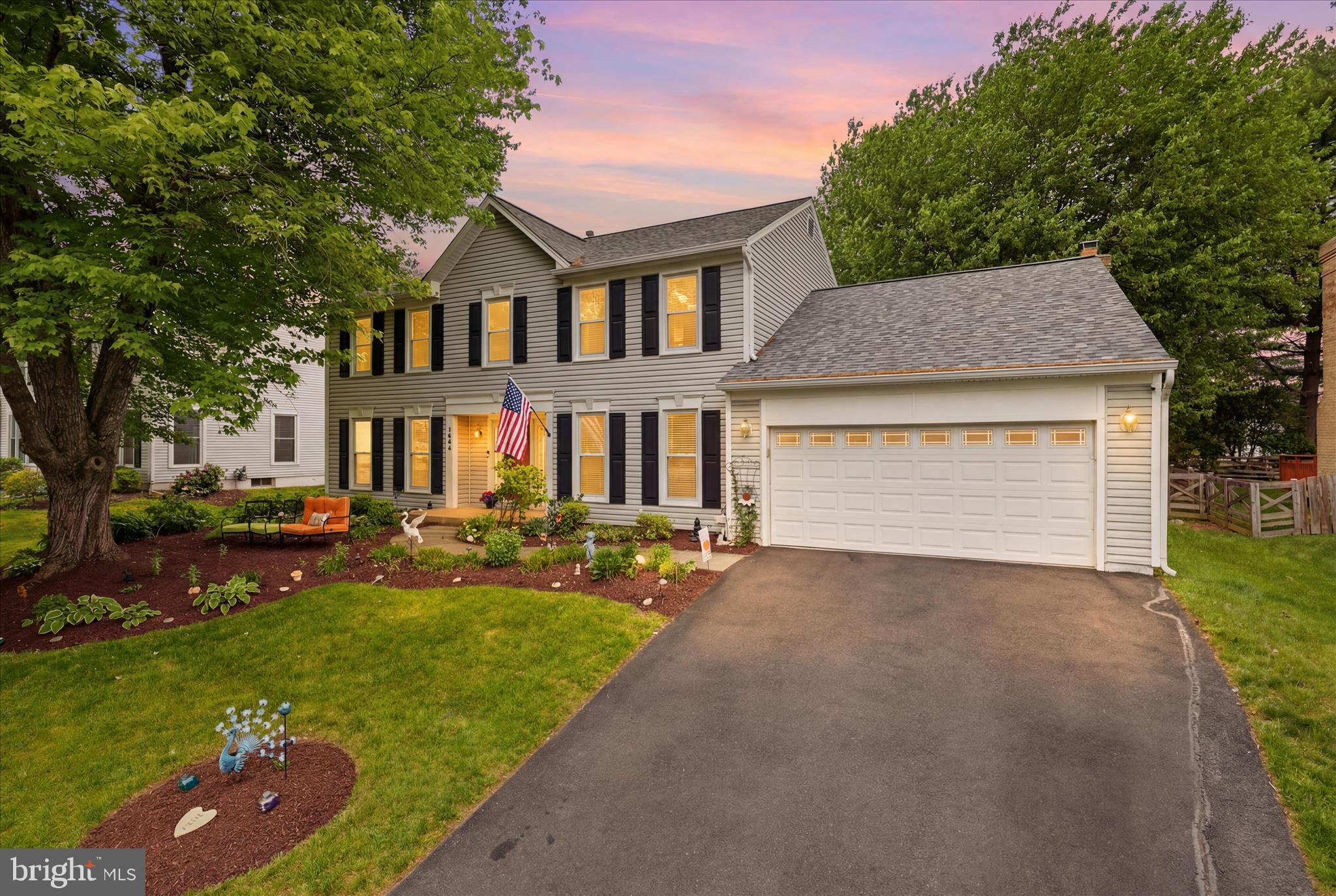 Welcome to 1498 Powells Tavern Place. Nestled in the charming Hiddenbrook community—one of Herndon’s most loved neighborhoods—this beautifully cared‑for colonial home offers the perfect blend of comfort, character, and everyday convenience.
This rare 5‑bedroom model features sun‑filled rooms, an open and inviting layout, and 3.5 well‑appointed baths. Crown molding and wainscoting add timeless charm throughout the home.  The main level flows effortlessly for both daily living or entertaining, highlighted by upgraded countertops, recessed lighting, and a warm, welcoming kitchen equipped with modern appliances. The cozy living area, complete with a brick‑surround gas fireplace, creates the perfect gathering spot on cooler evenings. Enjoy the oversized screened in porch right off the family room overlooking the massive fully fenced in yard.  Play, entertain and enjoy all year around!  Plus a new roof installed (2023)
The fully finished basement provides additional space for recreation, work, or relaxation, while the main‑level laundry room adds everyday ease. Step outside to a beautifully landscaped yard backing to serene trees—your own peaceful retreat right at home.
Location truly sets this property apart. Perfectly positioned directly across the road from Dranesville Elementary School, mornings become easier and the sense of community even stronger. Sidewalks, streetlights, and tree‑lined streets enhance the neighborhood’s welcoming feel.
This is more than a house—it’s a place where comfort, convenience, and community come together. A home ready to be enjoyed from the moment you move in and to be part of your next chapter.