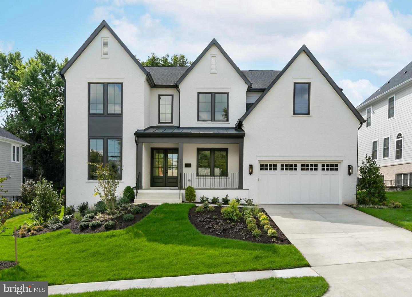 Cherry Hill Custom Homes presents 1558 Hane St. This beautiful, brick transitional design is sited on a 17,100 sq ft lot in an ultra-convenient McLean location. This home features 6 bedrooms, 6 full bathrooms, and two powder rooms with over 7100 square feet of finished living space on three levels. The main level boasts 10ft ceilings, gorgeous wide-plank European White Oak engineered wood floors, a gourmet kitchen with state of the art appliances, frame-less custom cabinetry and quartz countertops, a rear prep kitchen, large guest suite, and private study. Through the butler’s pantry is a large formal dining room for an unforgettable dining experience. The great room with gas fireplace and tile surround opens to a screened porch for the perfect combination of indoor and outdoor living spaces. The upper level is highlighted by a luxurious primary suite with sitting room, dual walk-in closets with built-ins, a spa-like bathroom with double vanities, stand-alone soaking tub, and heavy glass enclosed shower, three ensuite bedrooms, and a spacious loft area. The walk-up lower level is an entertainer's paradise with rec room with wet bar, game room, a golf simulator/media space, an exercise room, an additional ensuite bedroom, and a separate powder room.