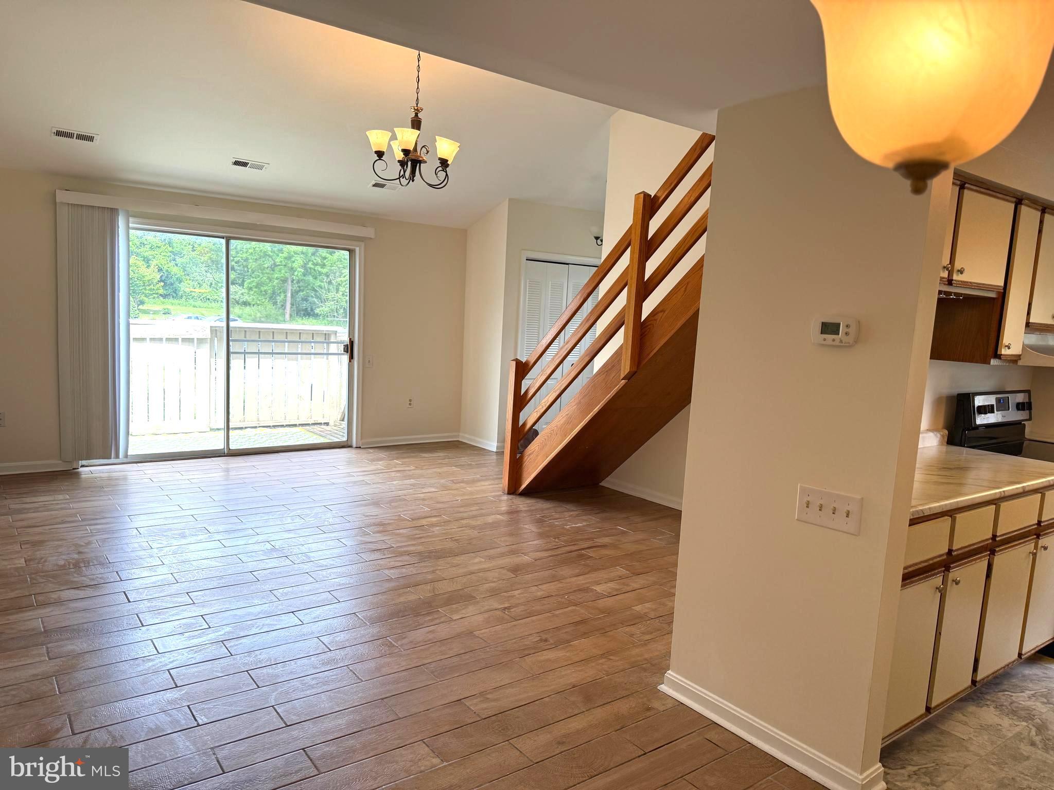 Welcome home to this charming 3-bedroom, 2-bath two-level villa where carefree living meets comfort! Enjoy a beautifully updated interior with fresh flooring throughout, a brand-new roof (2021), and modern appliances (2021). The spacious rooms and fenced patio create the perfect blend of indoor/outdoor living. Best of all, the HOA takes care of water, trash, snow removal, and lawn maintenance — giving you more time to enjoy life. Move-in ready and affordably priced in a fantastic location!