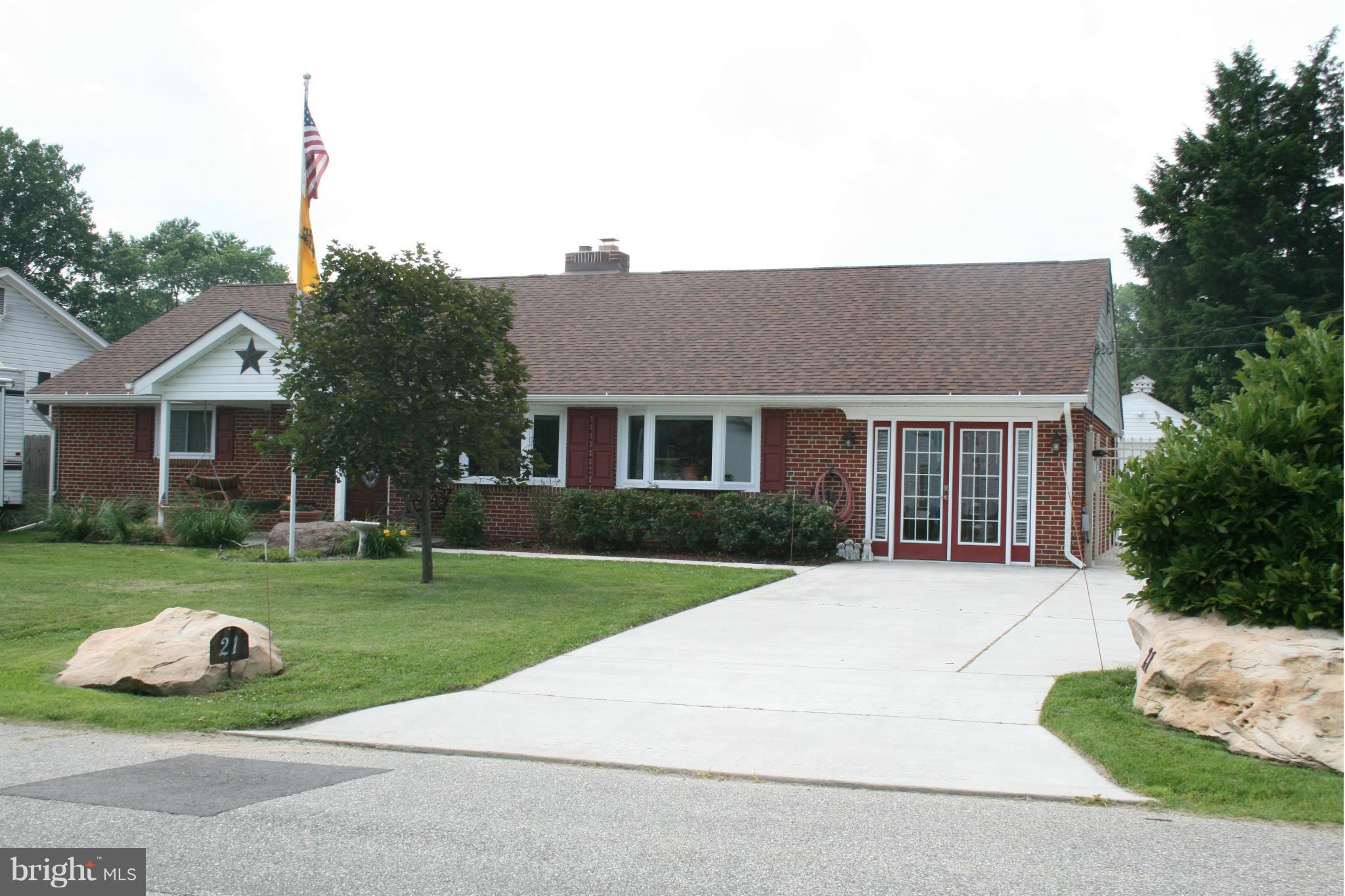 Check out this Large Brick Rancher with 3+ bedrooms, 2 full baths all on one level. Lot's of upgrades, Instant gas fired hot water system, almost new gas heating unit,  custom windows, Ceramic floors in Kitchen and bathrooms, Wall to wall fireplace in oversized living rm, Large concrete driveway going to work shop in rear of property with Electric, stainless steel appl, Bose system and more.