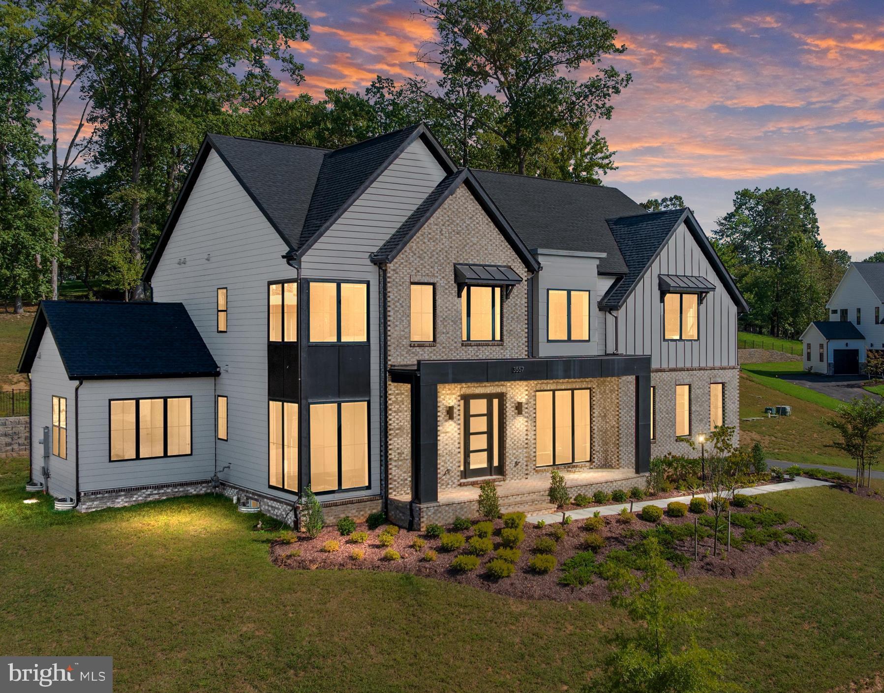 ***SPECIAL SELLER FINACING with LOW 3.5% Interest Rate!***  Welcome to this stunning luxury estate nestled in an exclusive enclave of just seven homes in Oakton! Built in 2023 and spanning over 6,200 square feet on a private .83-acre lot! This ENERGY STAR® certified home is located within the sought-after Oakton High School pyramid, Waples Mill Elementary, Franklin Middle, and just minutes from Flint Hill Private School. From the moment you enter, a two-story foyer and wide-plank hardwood floors set the tone for the open-concept main level. A front living room doubles as a home office, while the formal dining room with floor-to-ceiling windows is ideal for entertaining. The gourmet kitchen is the heart of the home, featuring Bosch and Thermador appliances, quartz countertops, an oversized island with bar seating, soft-close cabinetry with under-cabinet lighting, a custom backsplash, and a large walk-in pantry with built-in shelving. The adjoining family room with gas fireplace flows seamlessly to the kitchen and out to the new composite deck — perfect for everyday living and entertaining alike. A custom mudroom, main-level powder room, and a main-level bedroom with full bath complete the first floor, offering excellent flexibility for guests or multigenerational living.
Upstairs, the primary suite features a private sitting area, dual walk-in closets, and a spa-inspired bath with dual vanities, soaking tub, and frameless glass shower. Three additional bedrooms including a Jack-and-Jill suite and a private en suite along with an upper-level laundry room with custom storage completes upstairs. The finished lower level adds a spacious recreation room, recessed lighting, an additional bedroom and full bath, and generous storage — ideal for a home gym, media room, or guest quarters. Conveniently located near Fairfax Corner, Fair Oaks Mall, the Vienna Metro, and major commuter routes including I-66, Route 123, Route 50, and Lee Highway.  Property Survey, 3D Virtual Tour, and Floorplans are available.