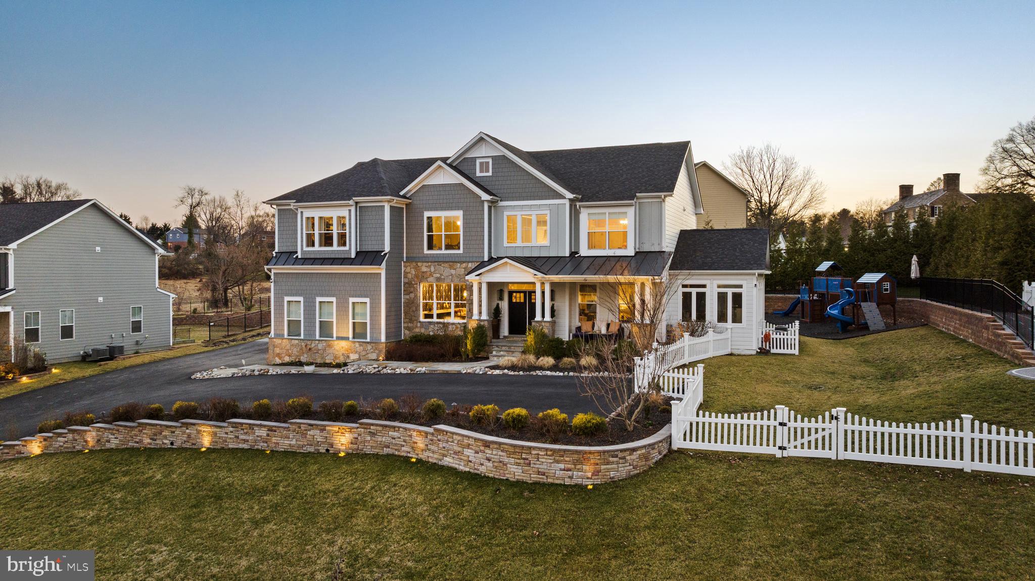 Located in the desirable Limekiln Farms, this like-new home checks all the boxes. Built in 2020 with many subsequent upgrades, the exceptional residence offers over 7,500 square feet of refined spaces. Welcome home to three full levels thoughtfully laid out and designed for today’s living. The one-of-a-kind home blends elements of timeless craftsmanship with a twist of modern luxuries and state of the art technology throughout. Special features include a private theater, full bar, resort-style outdoor amenities including a bocce court, fire pit, outdoor kitchen, and custom recreation spaces.

Entering a grand two-story foyer with a sweeping staircase introduces interiors defined by bespoke millwork and high-end finishes. The oversized eat-in chef’s kitchen impresses with a substantial Calacatta marble island, premium appliances, and a dedicated coffee and wine bar, flowing seamlessly into sunlit gathering spaces. A bonus on the main level is a private office, which depending on one’s needs, could also serve as a first floor bedroom with a recently updated en-suite full bathroom. 

The upper level is anchored by a luxurious primary complete with a spa-inspired bath; dual vanities, a double walk-through shower and an expansive custom California Closet walk-in closet. Three additional bedrooms, two well-appointed full bathrooms, and convenient laundry are found on this floor.

Designed for entertaining, the lower level features a hidden speakeasy-style entrance leading to a state-of-the-art theater, full wet bar, wine display, additional bedrooms or storage rooms, and flexible living spaces.

While the home itself is a retreat you may never want to leave, when life calls, enjoy the convenience of being close to everyplace you need to be. With incredibly easy access to I-695, the location becomes an easy commute to everyplace from downtown Baltimore to northern Baltimore County, BWI airport, and numerous local schools and amenities.