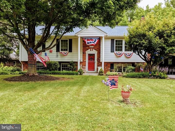NEW PRICE and  $5000.00 BUYER CLOSING COST ASSISTANCE TOO!  Seller has found home and is ready to MOVE!
Spacious CLOVER HILL well maintained split foyer with so many upgrades and improvements you'll want to see this one immediately!  This 4 bedroom home has much to offer including updated kitchen  in 2020 with quartz counter tops and Stainless steel appliances.  There's a breakfast bar in the kitchen for added convenience too.  The adjoining sunroom is where you'll have a panoramic view of the gorgeous yard and landscaping.  This sunroom features casement windows with wood flooring and leads to a small deck to access the rear yard.  Through the living room you'll find the formal dining room -the great space for formal gatherings or parties.  The primary bedroom is spacious with adjoining primary bath featuring double sink vanity and shower.  There are 2 other spacious bedrooms and a hall bathroom with ceramic tile bathtub too.  Each bedroom has closets for ample storage.  
The lower level has an additional bedroom with full size windows making this bright and cheerful!  The HUGE family room has a wood burning fireplace with wood stove insert that conveys.  The flooring is "LifeProof" by Home Depot with built in insulation .  There is an additional bathroom with walk in shower.   The lower level  has many possibilities for having multi-generational living for families.    There is garage access from the lower level where you'll be surprised by the space! This is truly an "oversized garage!"   Car buffs or a great space for just hanging out, this is the spot!!!
Don't forget to check out the backyard.  This is such an peaceful space with lots of greenery and mature trees.  The owner mentions that there are birds, and other critters, including deer that sometimes wander n  so you'll feel like you're int he country, but in fact, you're minutes from shopping and restaurants!
For those that are handy....there's even a workshop!  The workshop has electric and ample space to be  potting shed, or wood working.
Upgrades and recent improvements include: Roof  and new gutter system 2020, Heat Pump replaced in 2019, Water softener 2026, new sump pump 2021, new well pump in 2025, , UV light,  new Garage door w/opener, 2026, New clothes washer2026  and New dryer-June  2026,  Many Windows on the upper level have been replaced
There's so much to see so plan to see this one today!  Some rooms are virtually staged to give an idea of furniture placement!