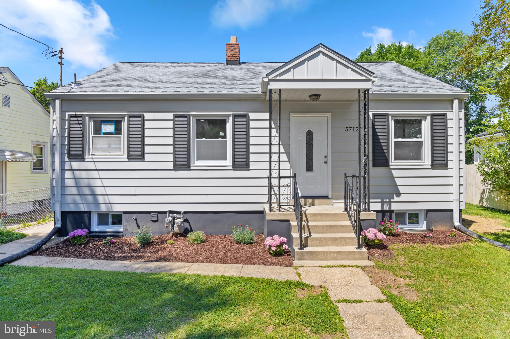 Open House on Sunday, June 7th, from 1:00 PM to 4:00 PM ... Beautifully renovated single-family home nestled in the heart of Hyattsville, where convenience and modern living come together perfectly. Ideally located just minutes from the Metro, The Mall at Prince George's, shopping, dining, entertainment, and major commuter routes... this home delivers both comfort and accessibility. Inside, you'll find 4 spacious bedrooms and 2 full bathrooms thoughtfully distributed across two finished levels, with each level featuring 2 bedrooms and 1 full bath. The main level showcases an open-concept layout with a stunning kitchen featuring elegant cabinetry, quartz countertops, stainless steel appliances, upgraded lighting, and modern finishes throughout. Fresh paint, stylish fixtures, and quality craftsmanship create a warm and inviting atmosphere from top to bottom. The fully finished lower level offers additional living space along with its own private side entrance, providing flexibility for guests, extended family, or a home office setup. Outside, enjoy a large backyard perfect for entertaining, relaxing, or future possibilities. To top it all off, the home has been enhanced with a brand-new roof and HVAC system, offering peace of mind for years to come. Join us and experience everything this exceptional home has to offer.