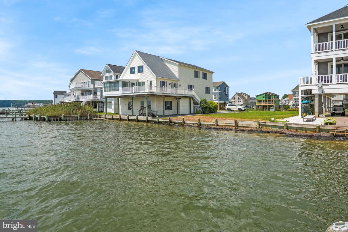 Discover the stunning beauty of Lot 1000 Bayside Dr in the amenity-rich community of Captain’s Cove. This premier bayfront lot offers a tranquil setting with a pristine sandy beach, perfect for relaxing and making lasting memories. Enjoy breathtaking, spectacular sunsets that paint the horizon in vibrant colors each evening, creating a truly mesmerizing view. Whether you’re looking to build your dream home or a vacation retreat, this exceptional property combines natural beauty with the luxurious amenities of Captain’s Cove, making it the ideal waterfront oasis.